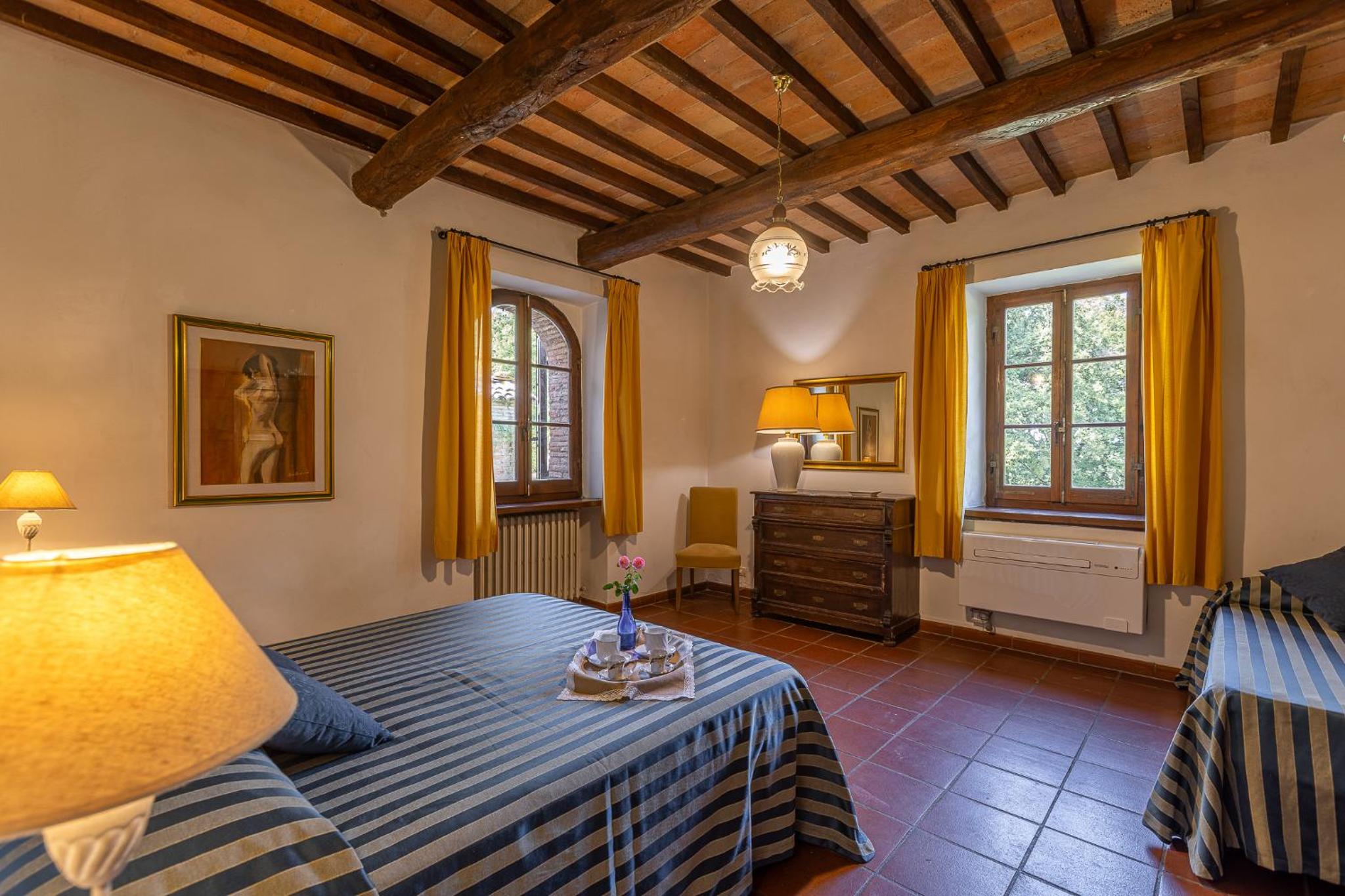 Appartamento con 3 Camere da Letto e Vista Giardino