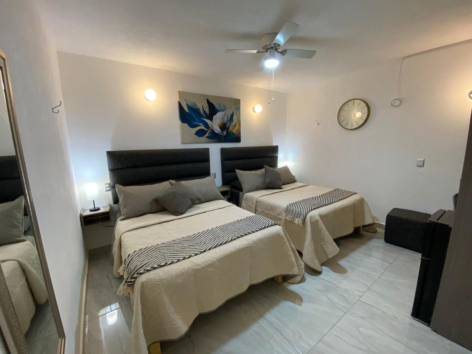 Deluxe Queen Room with Two Queen Beds photo 1