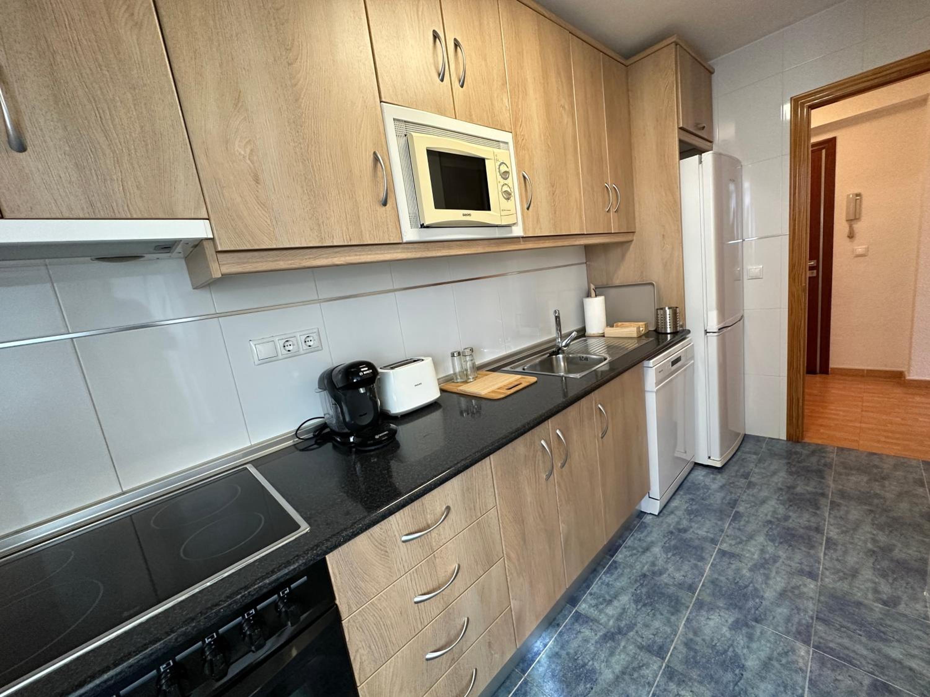 Three-Bedroom Apartment photo 2