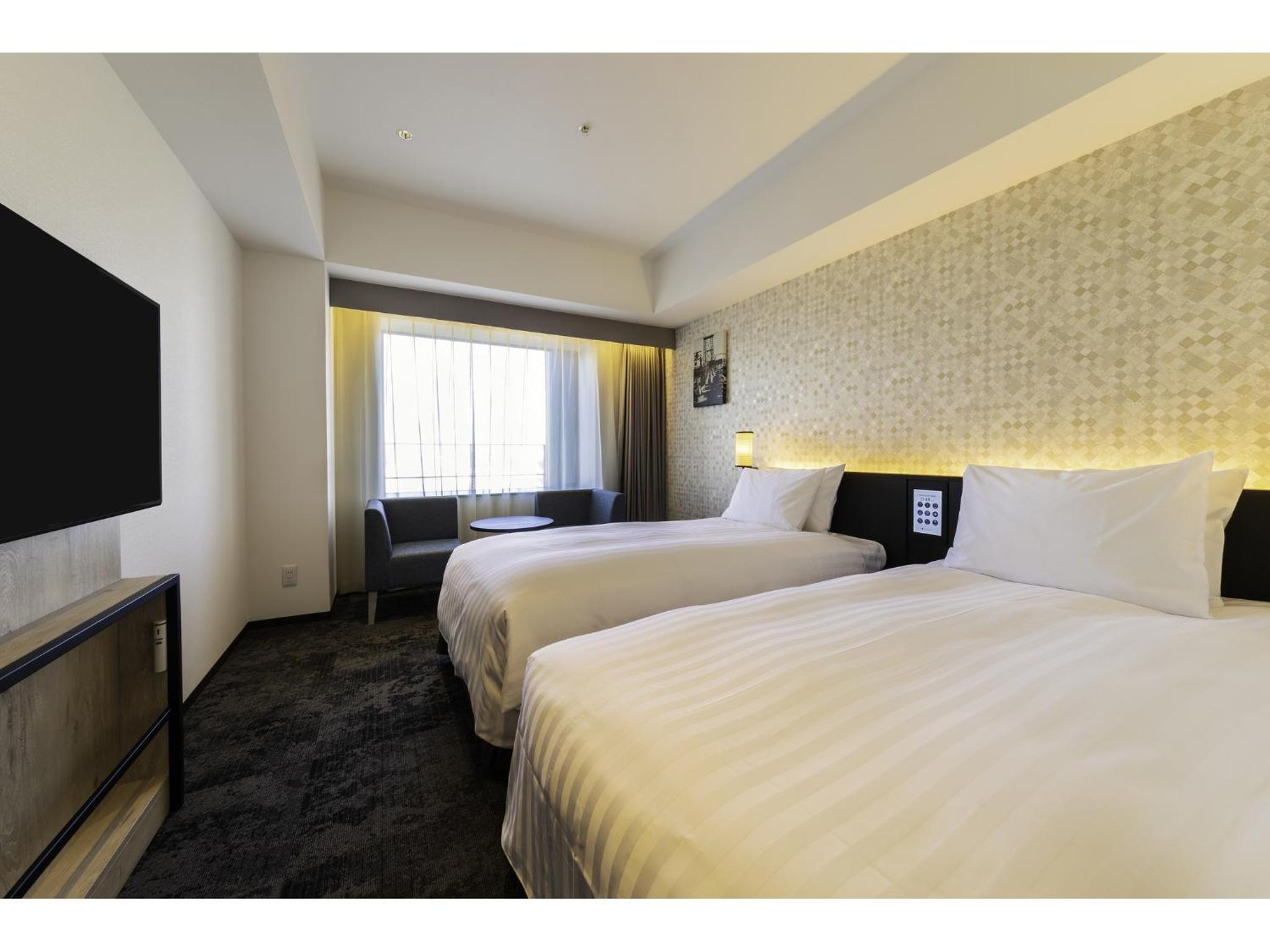Standard Twin Room - Photo 16