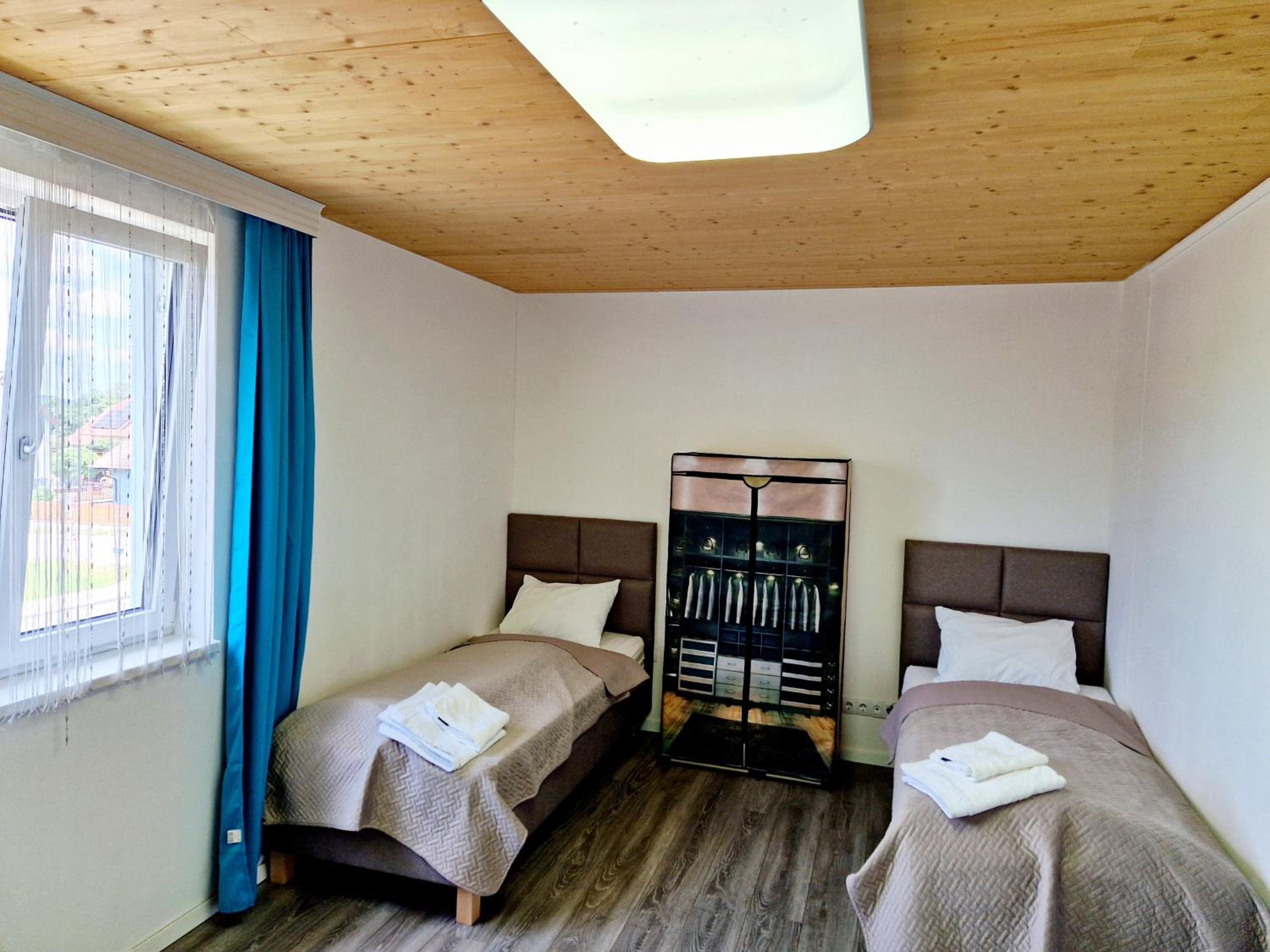 Three-Bedroom Apartment - Photo 8