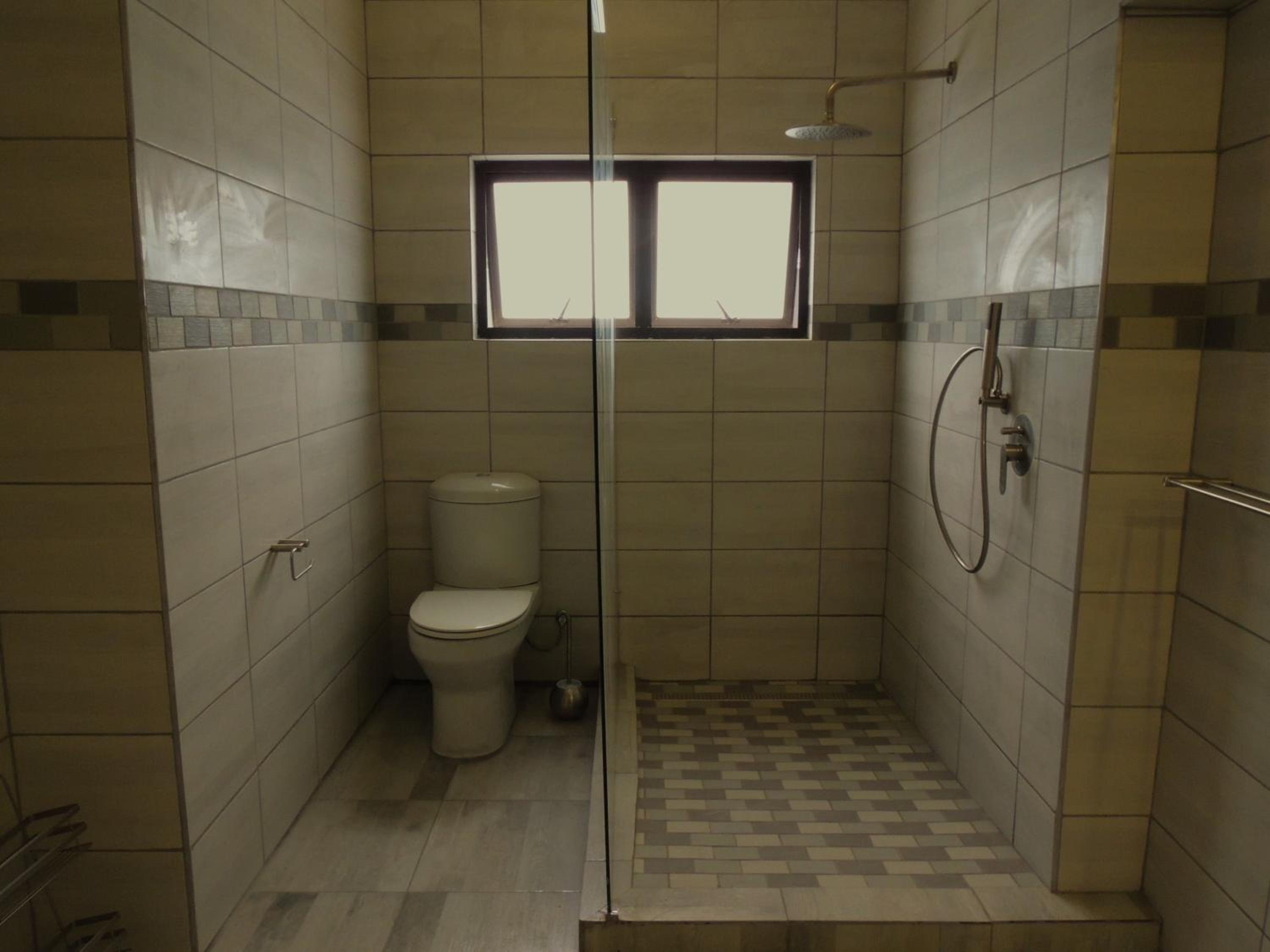 Three-Bedroom House - Photo 19