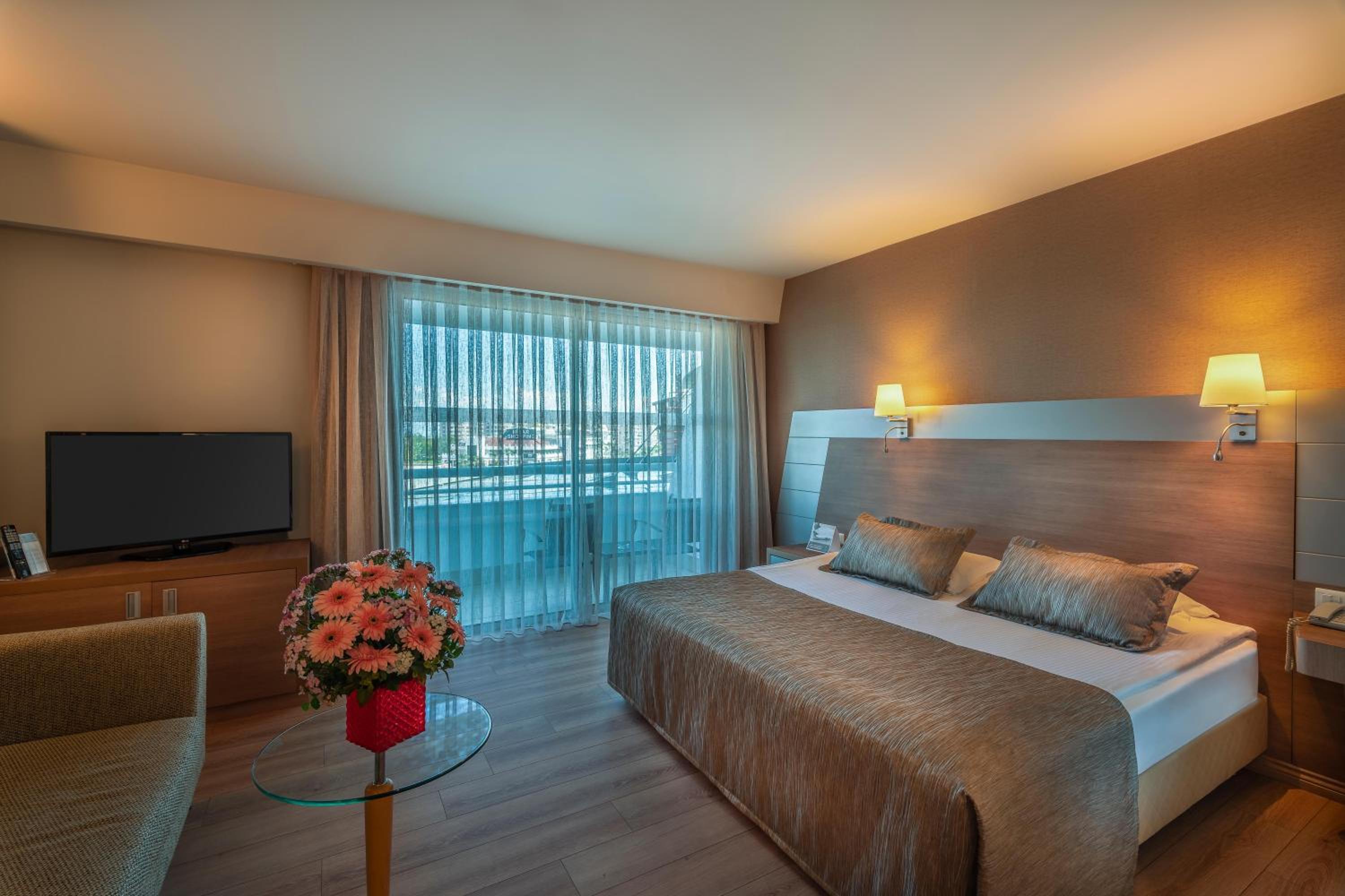 Deluxe Room with City View and Balcony