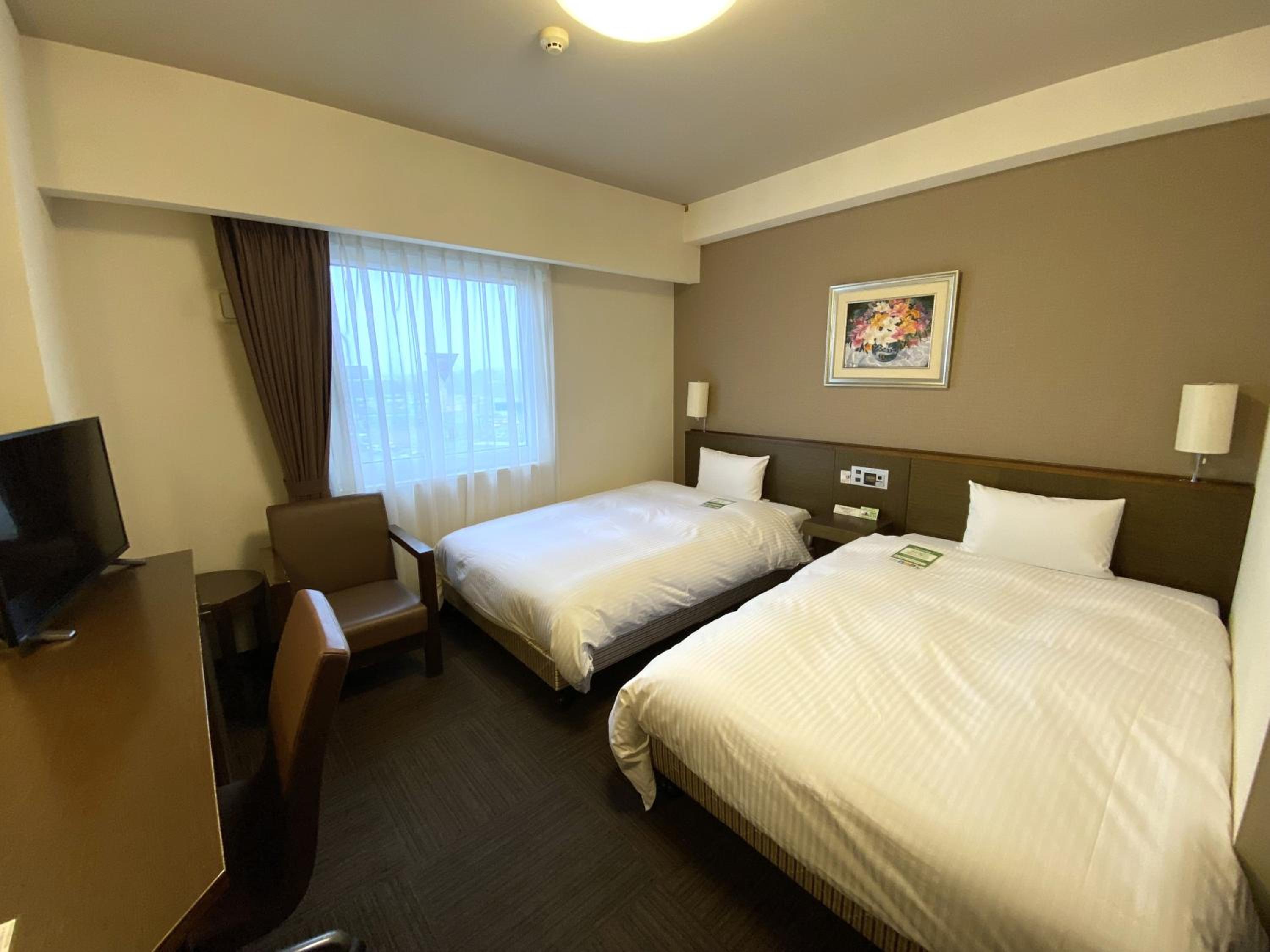 Twin Room - Non-Smoking - Photo 1