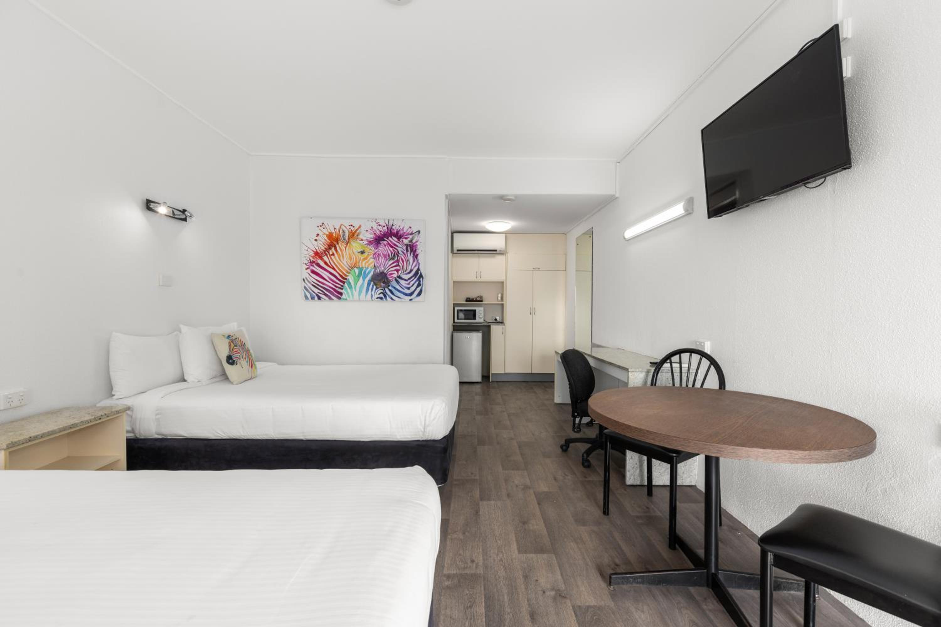 Pet Friendly Deluxe Family Room with Two Queen Beds - Photo 5