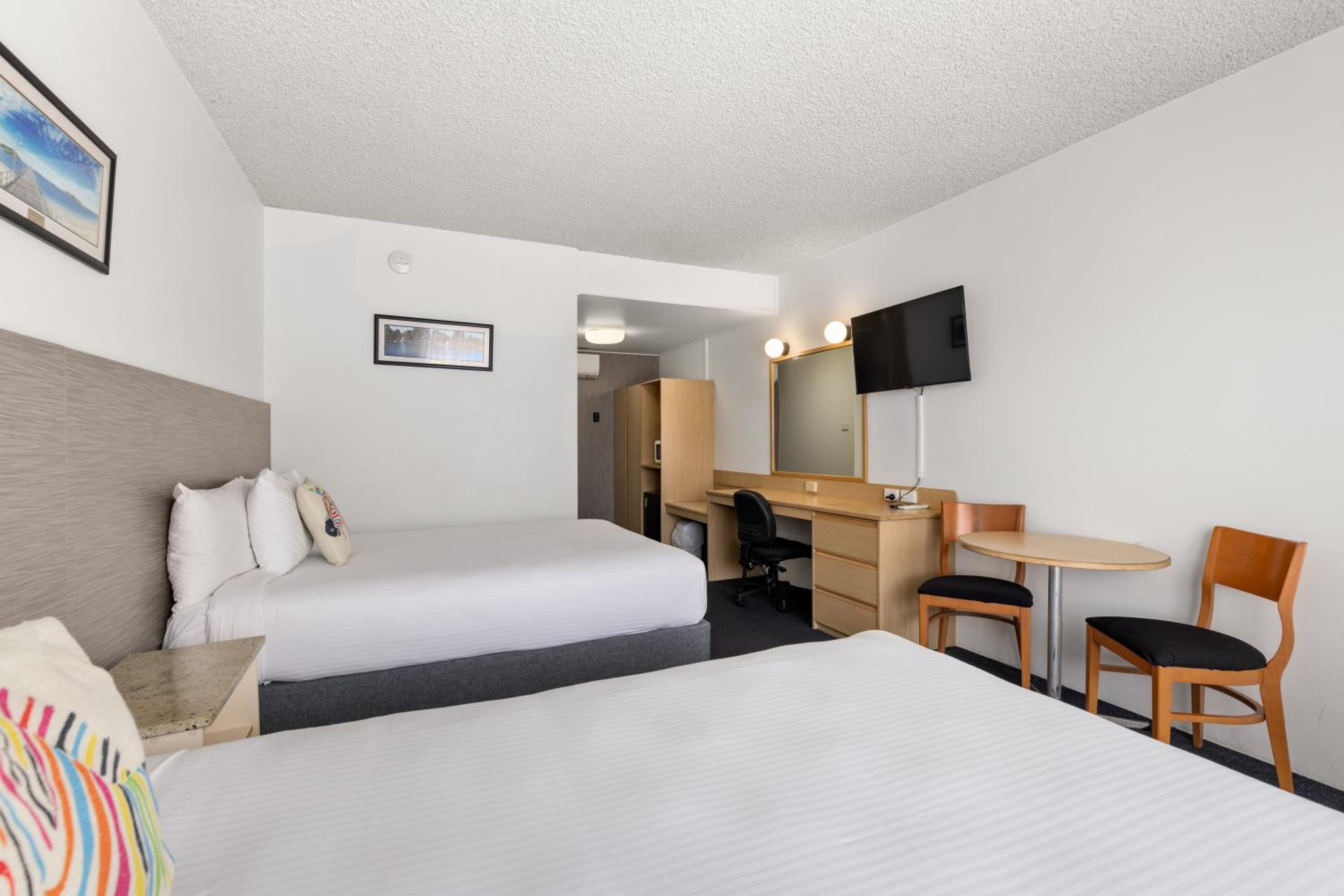 Deluxe Twin with 2 Queen Beds - Not Pet Friendly - Photo 7