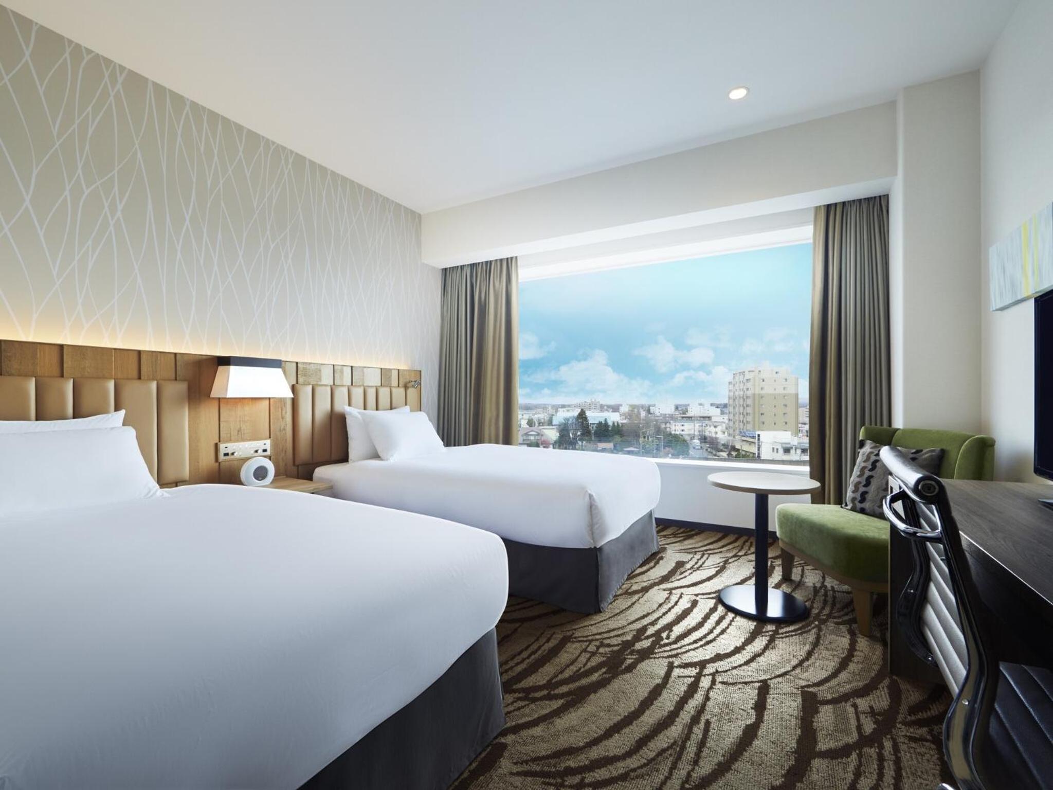 Premium Twin Room - Photo 1