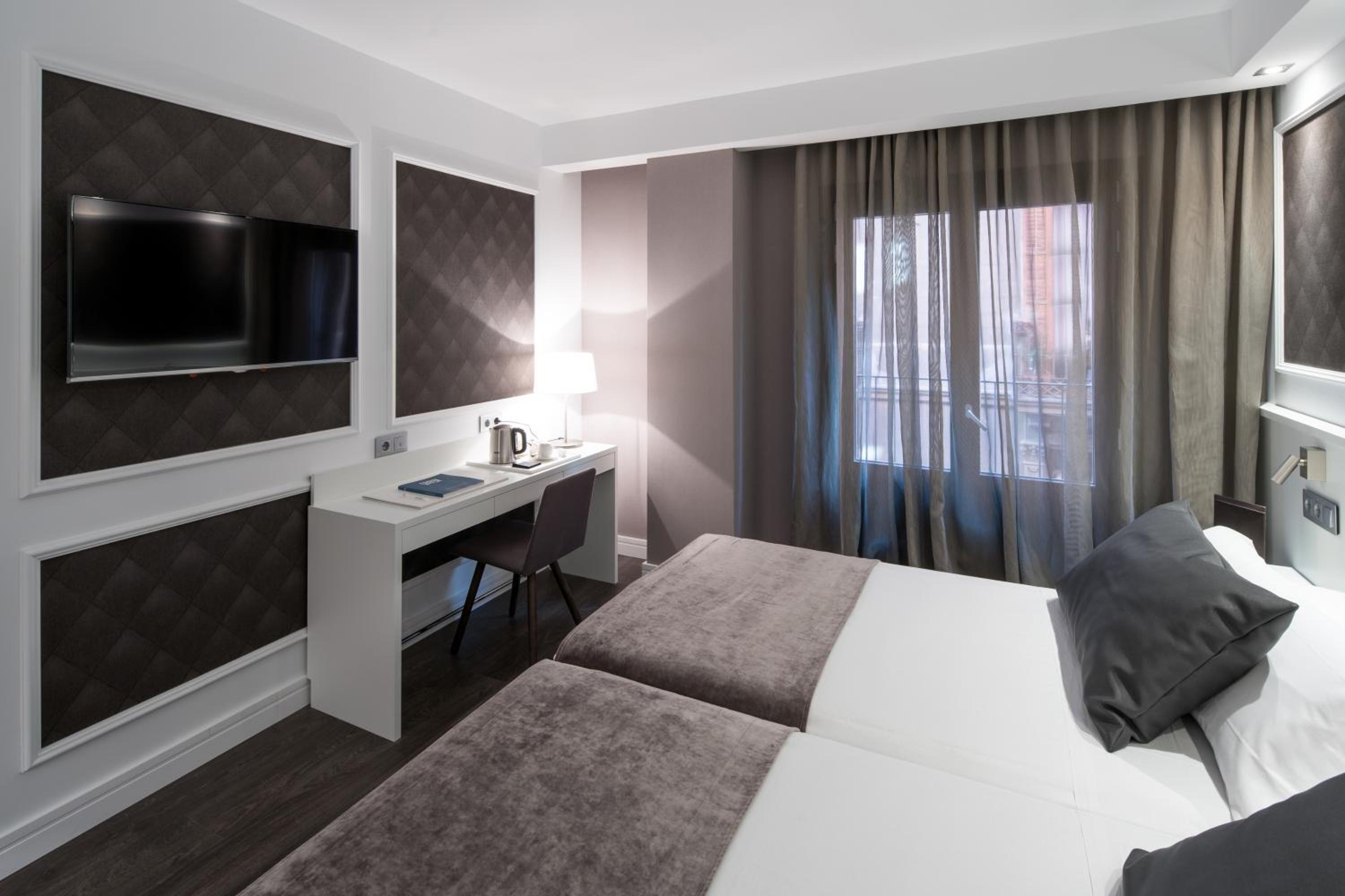 Quadruple Room (2 Adults + 2 Children)