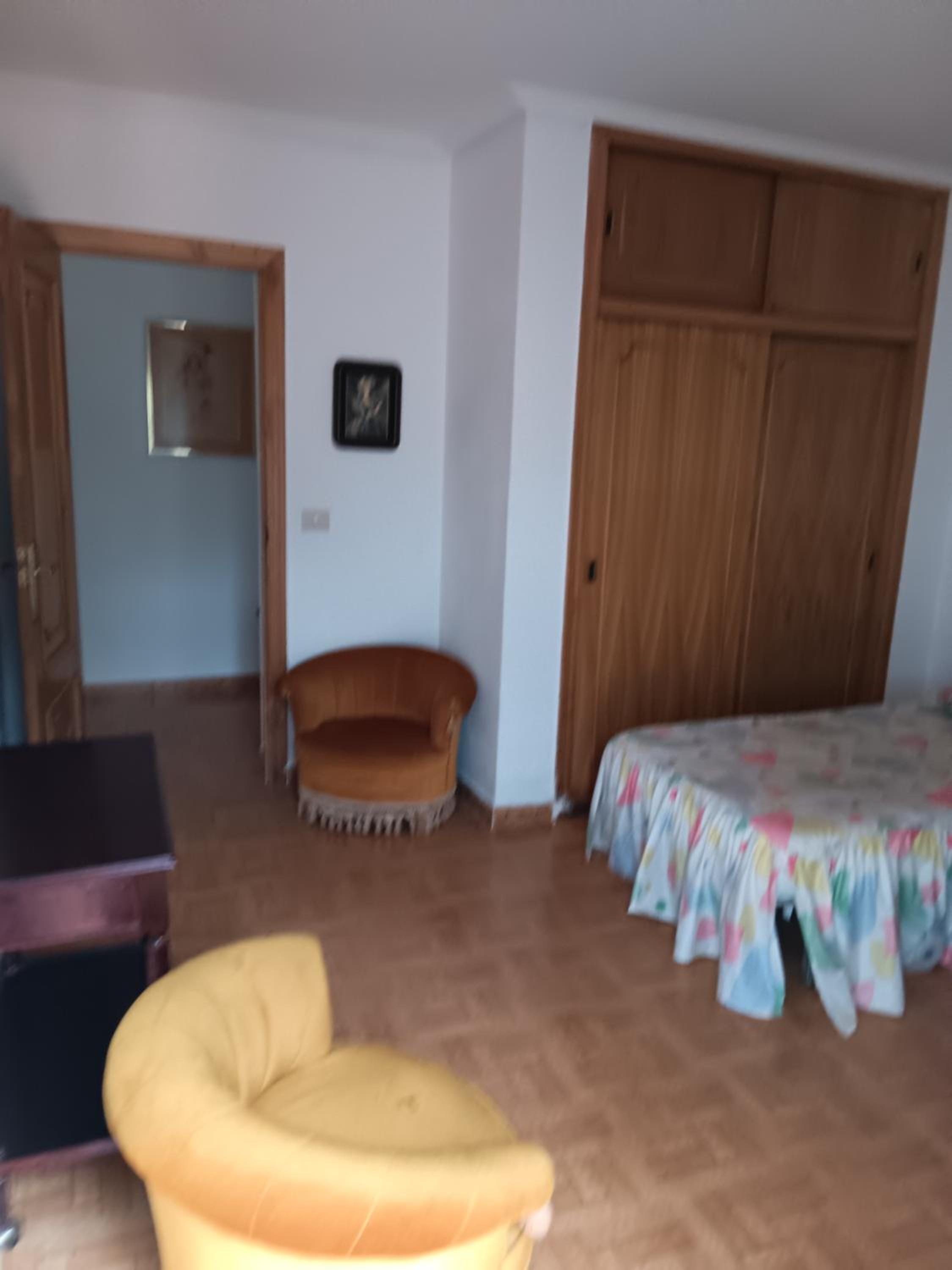 Casa de cuatro habitaciones