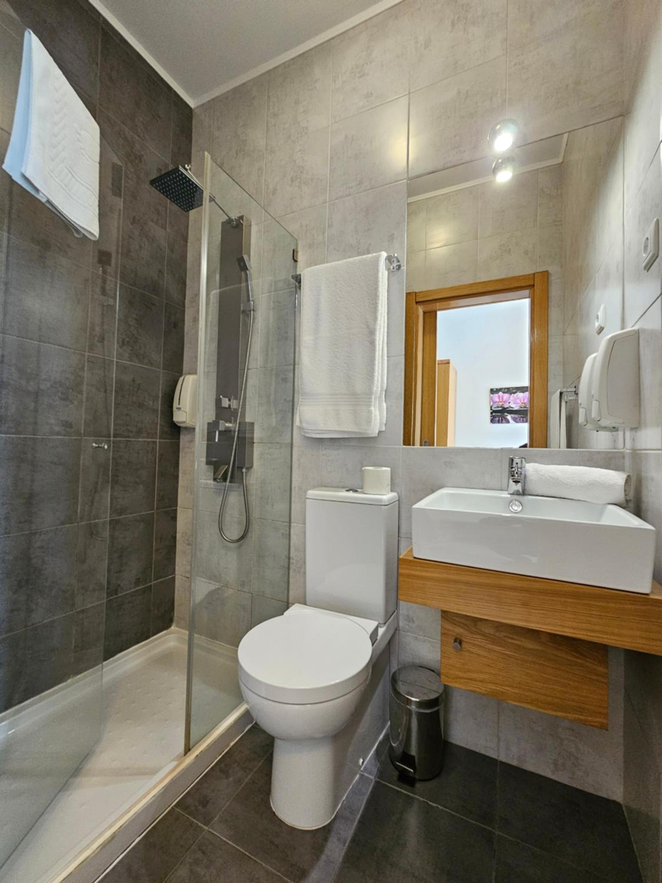 Three-Bedroom House - Photo 18
