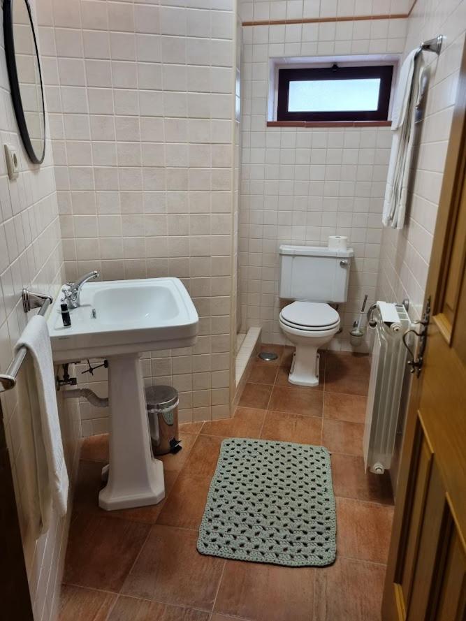Three-Bedroom House - Photo 27