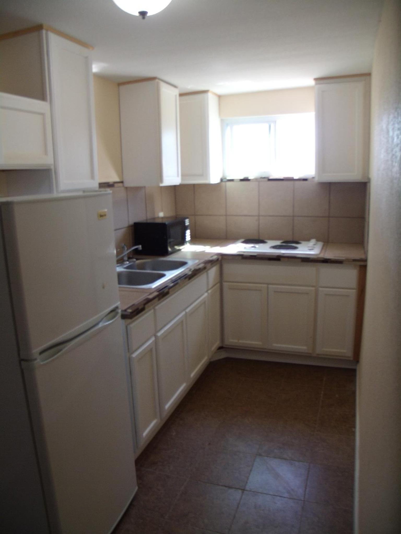 Queen Room with Two Queen Beds with Kitchenette photo 2