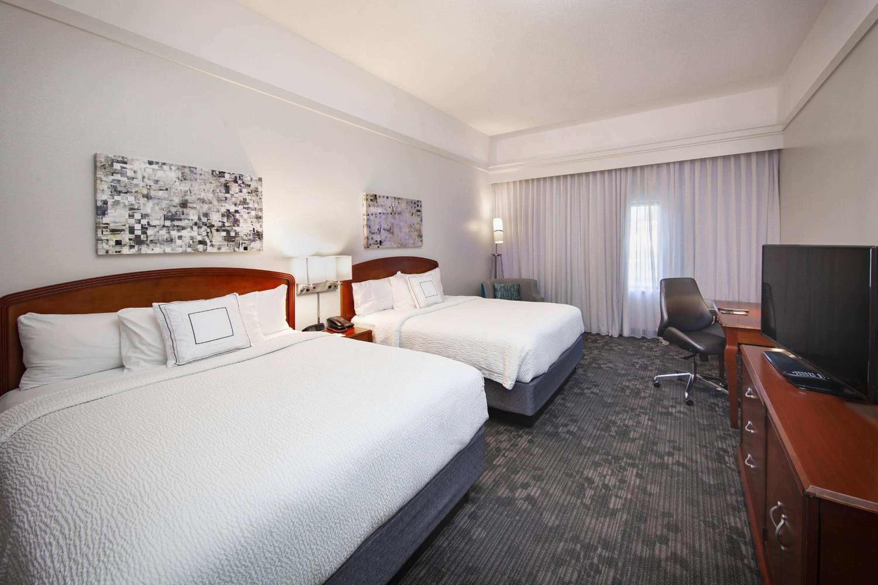 Queen Room with Two Queen Beds - Photo 1
