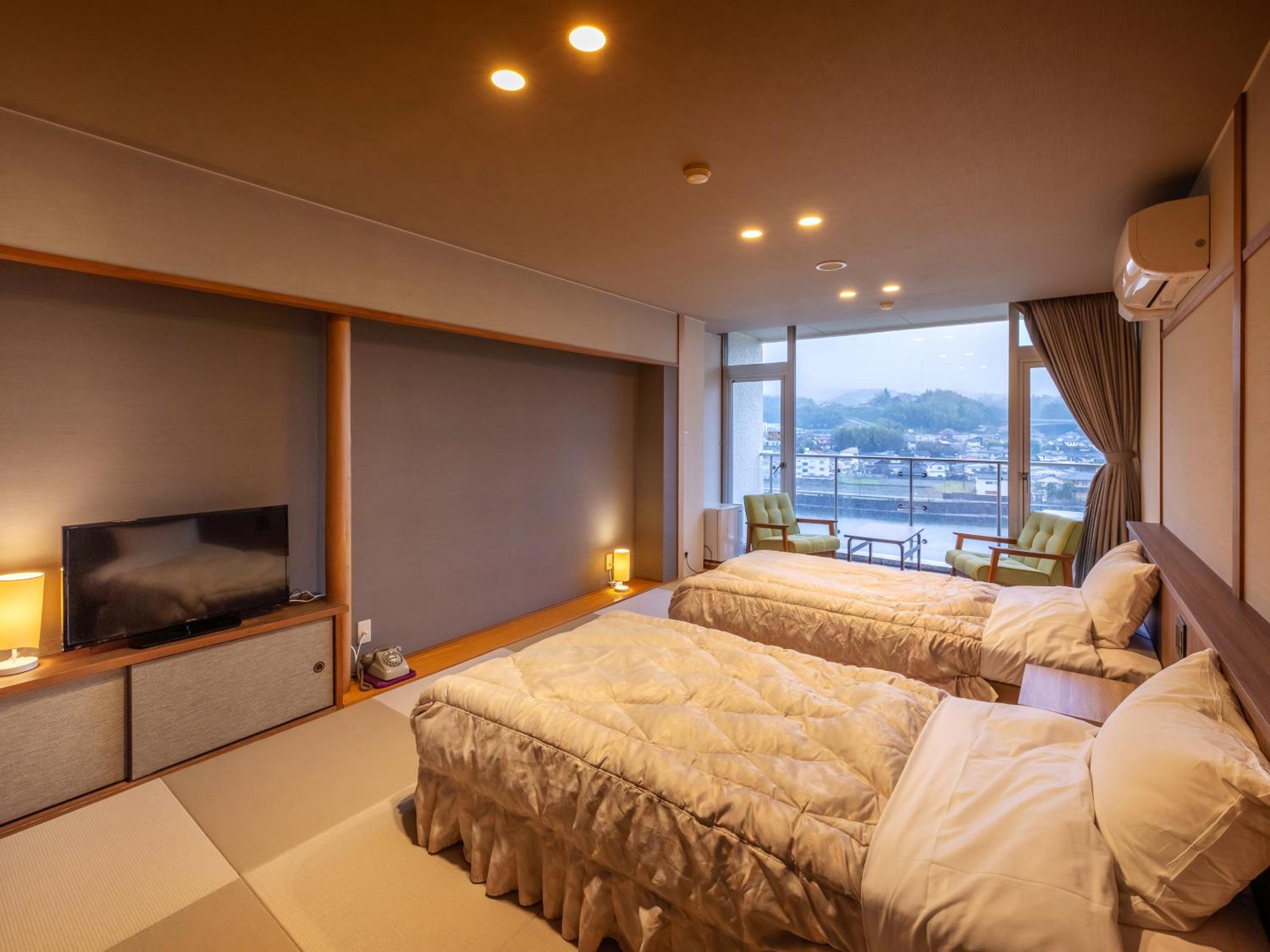 Standard Twin Room - Photo 1