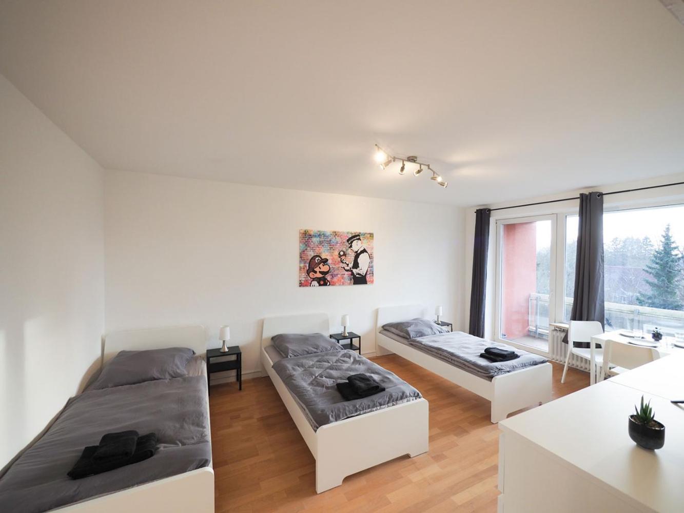 Three-Bedroom Apartment photo 1