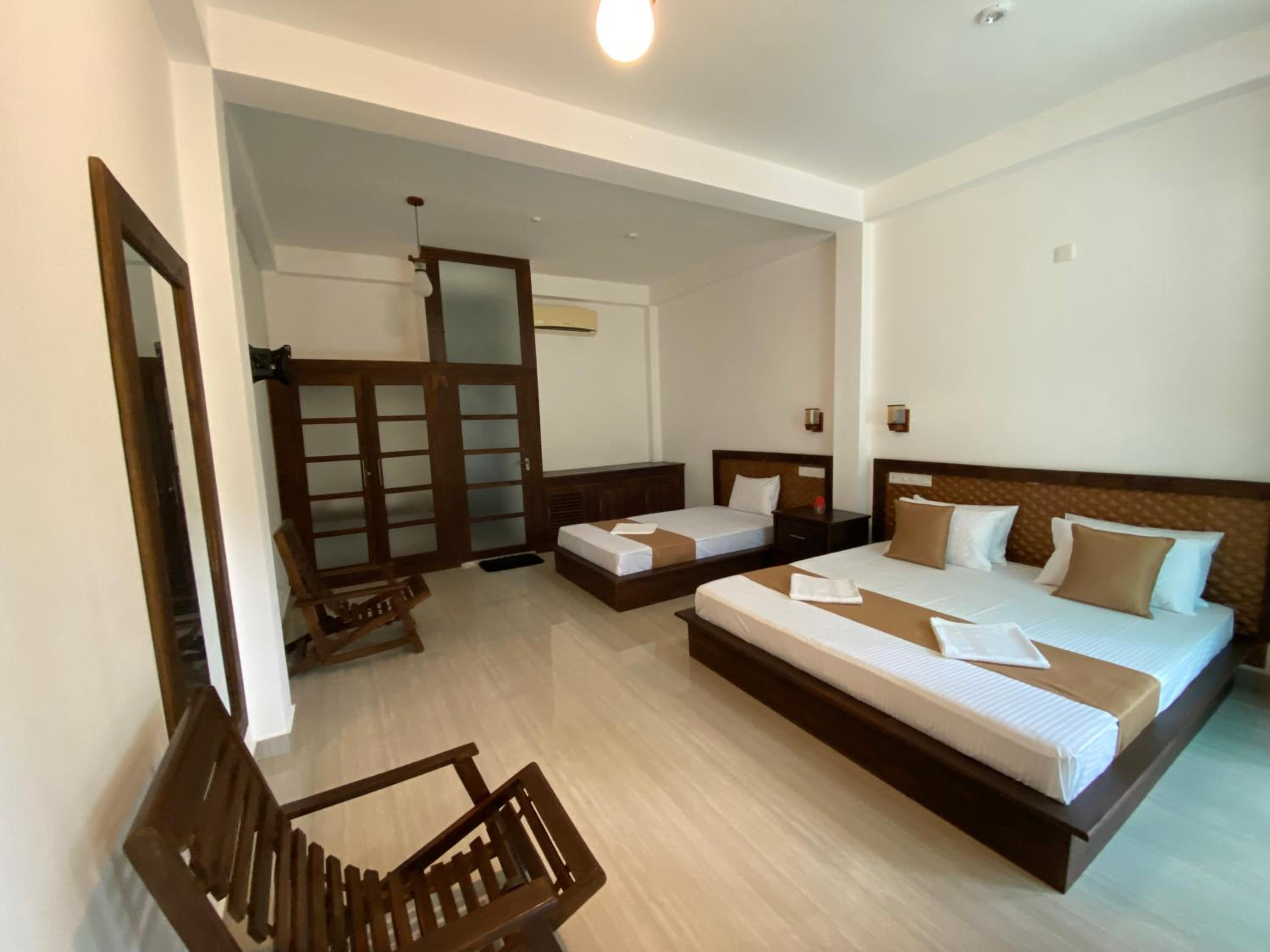 Deluxe Triple Room