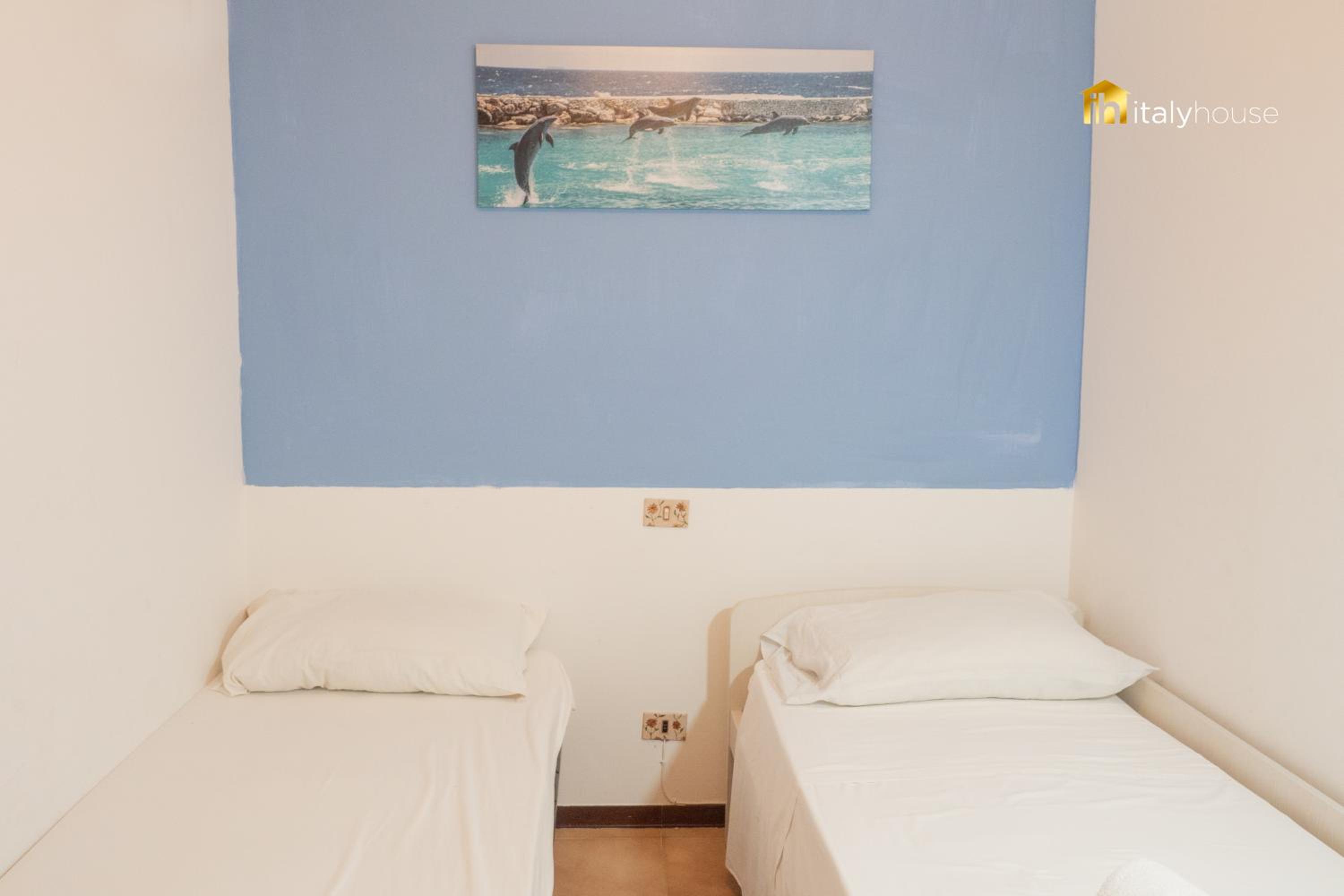 Four-Bedroom Apartment With Balcony 