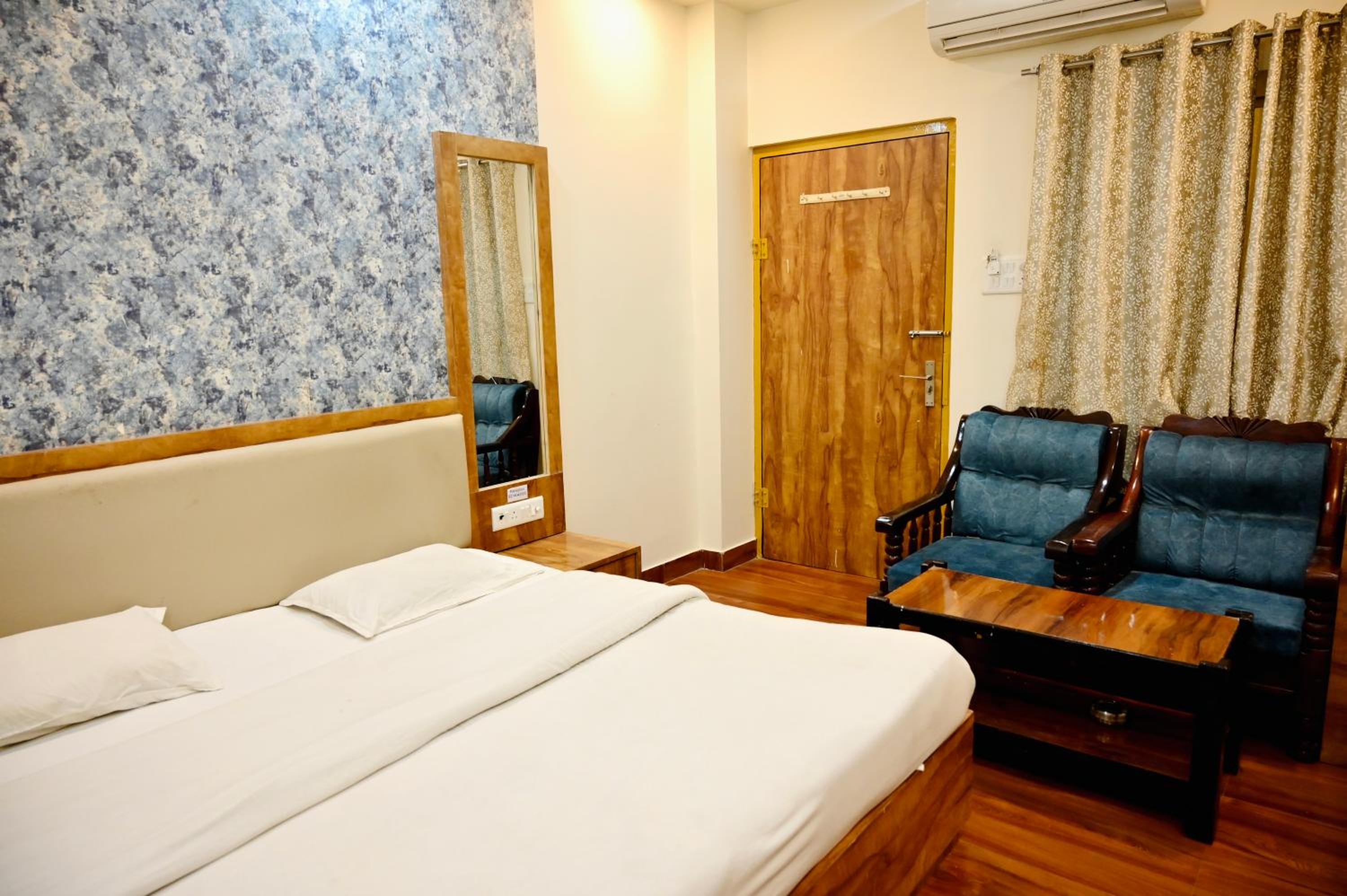 Deluxe Room - Photo 1