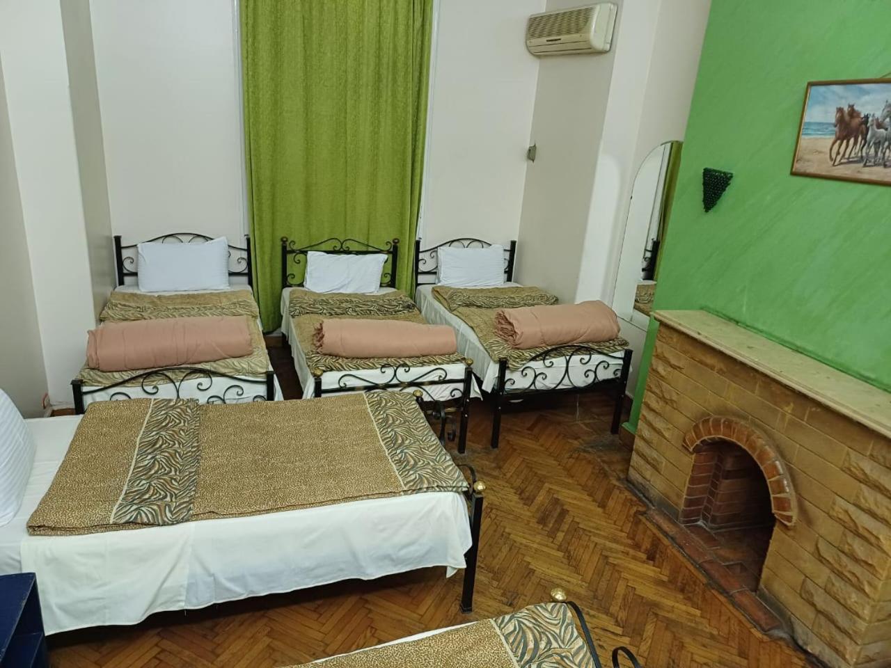 Camera Familiare con Bagno in Comune