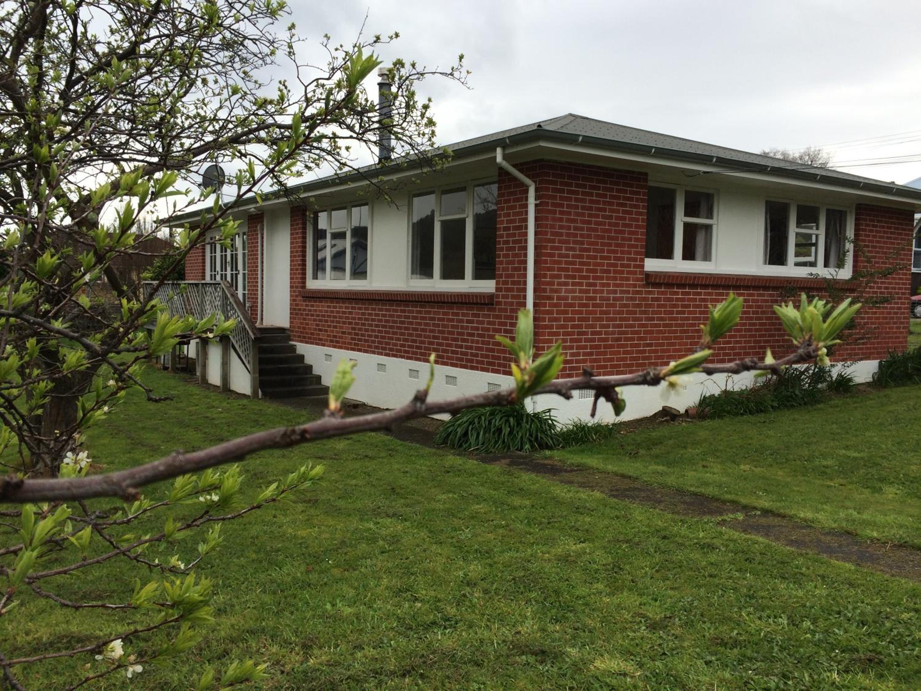 Three-Bedroom House - Photo 4