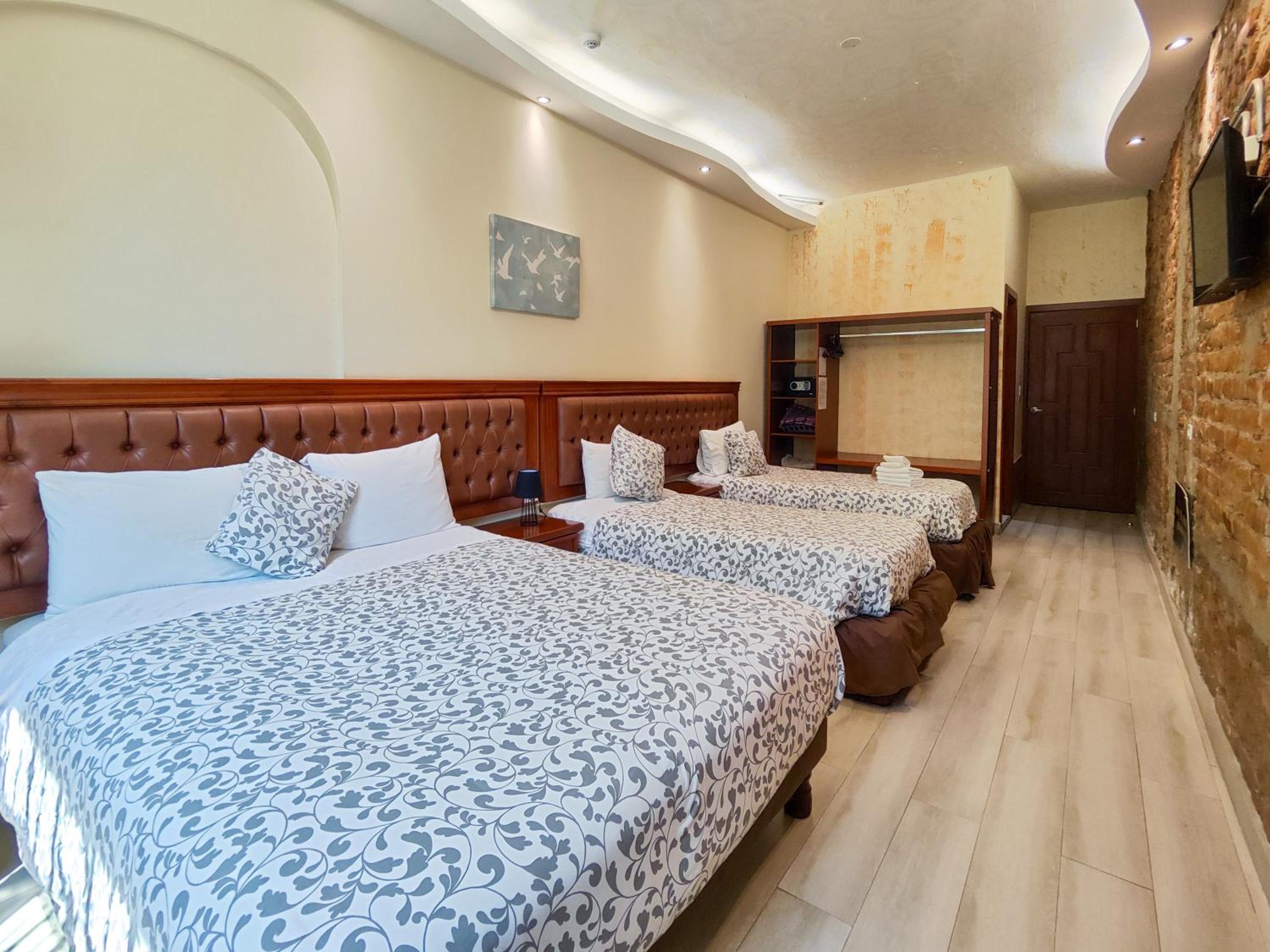Deluxe Triple Room