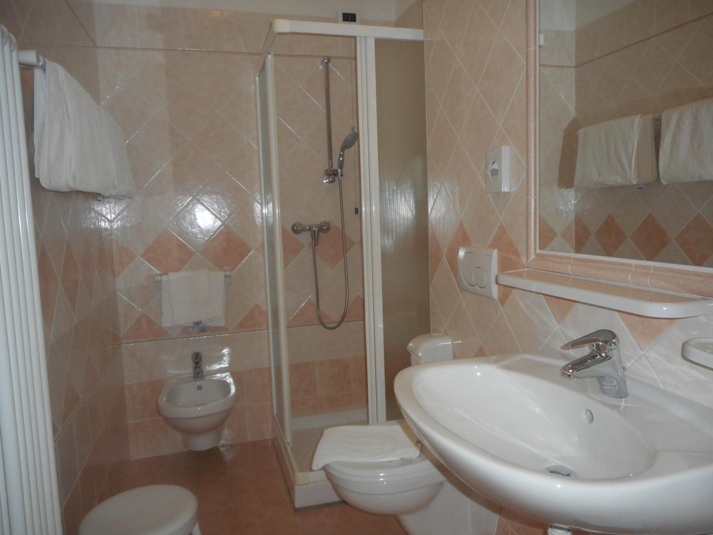 Quadruple Room with Balcony photo 2