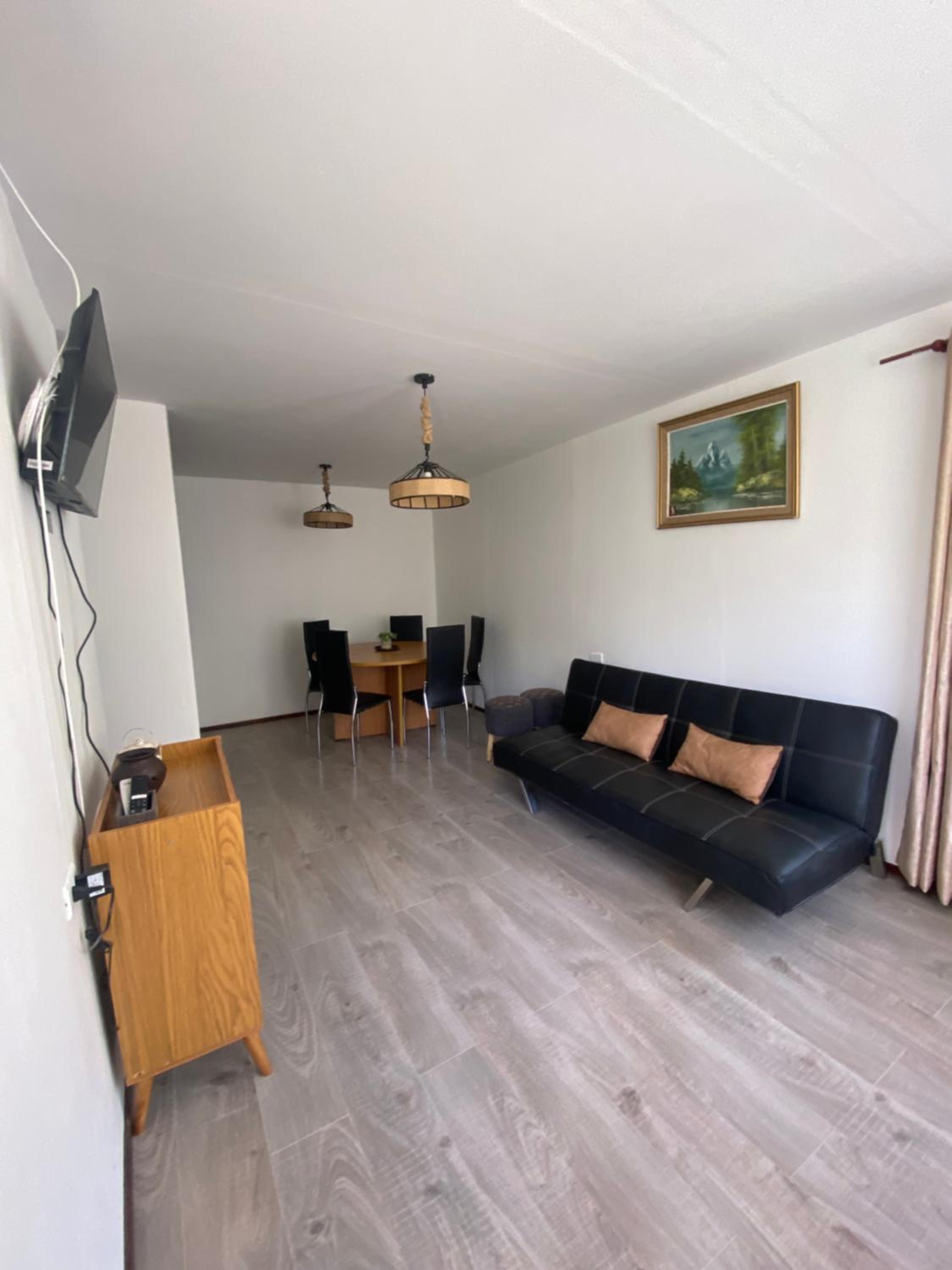 Three-Bedroom Apartment photo 1