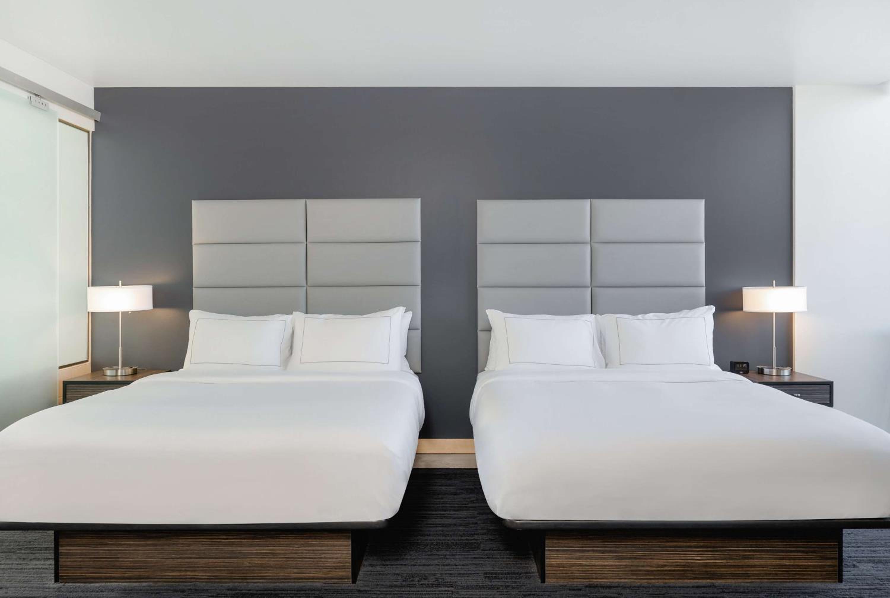 Queen Room with Two Queen Beds, Kitchenette and Balcony photo 2