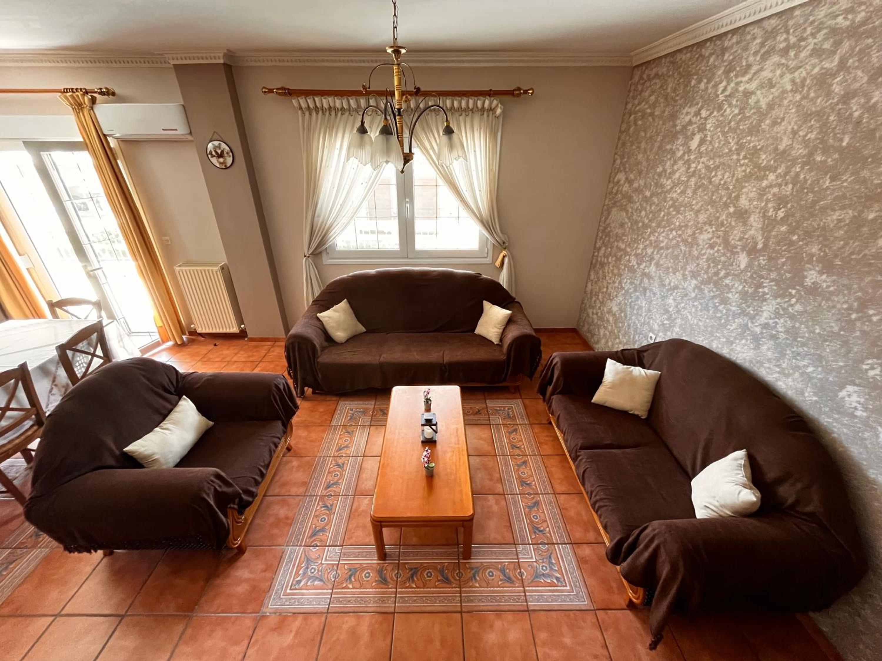 Three-Bedroom Apartment photo 1