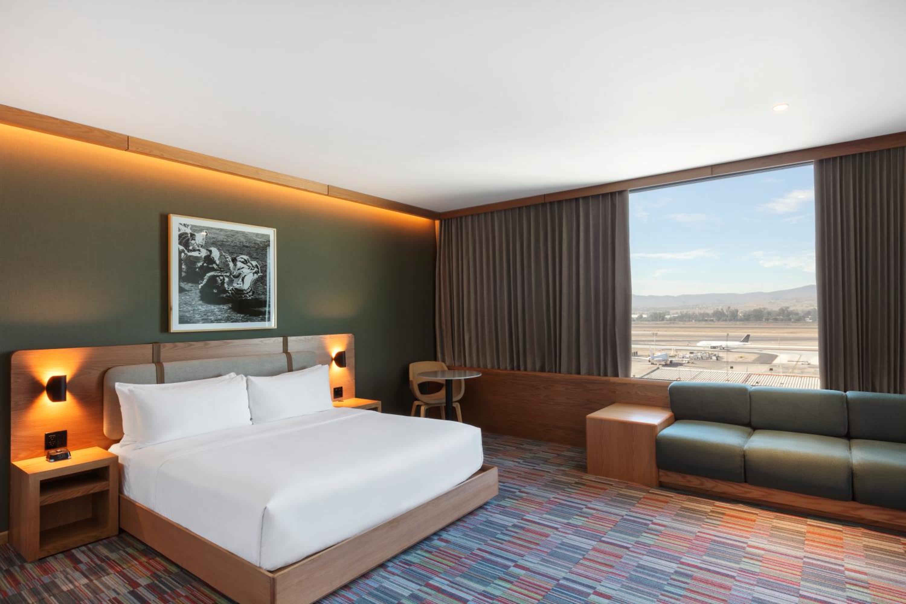Junior King Suite with Airport View - Photo 1