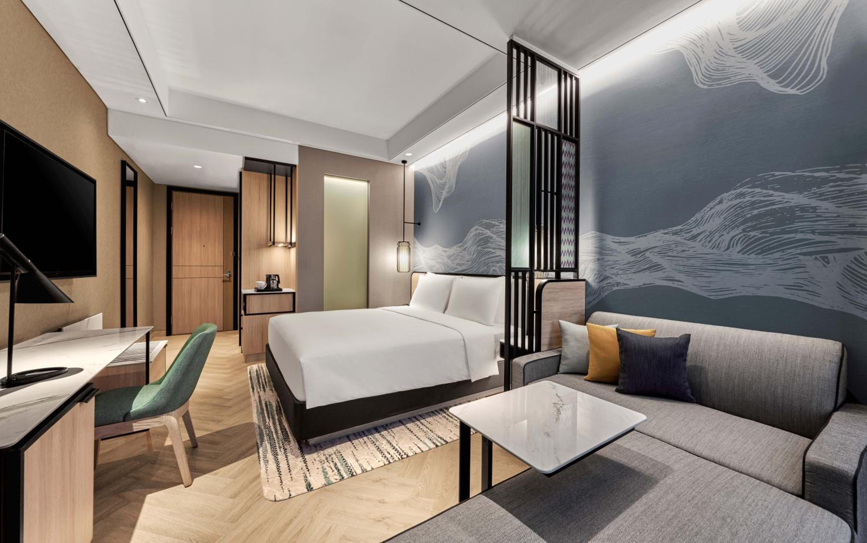 King Corner Room with Sofa Bed and City View - Photo 1