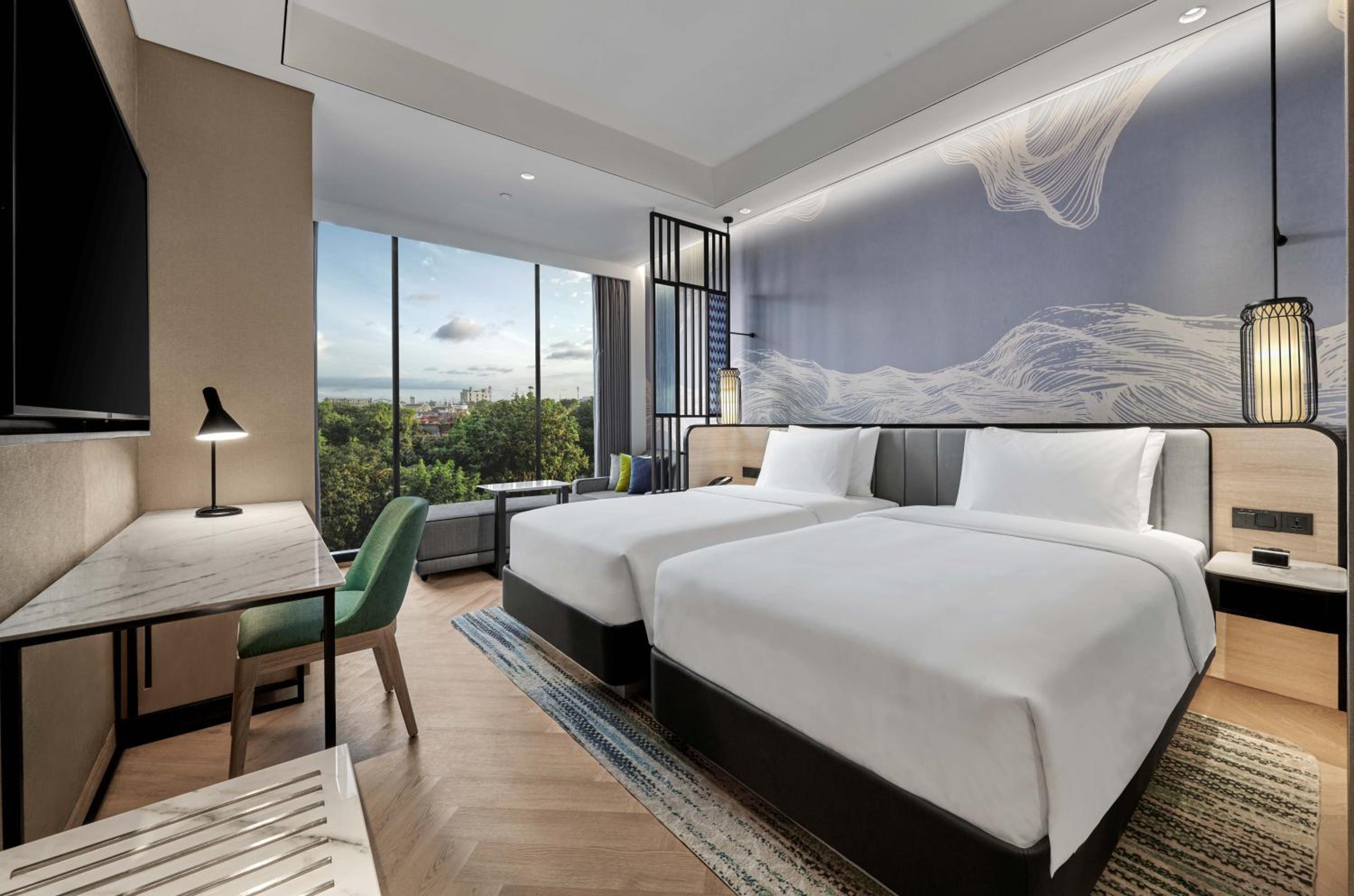 Twin Room with Sofa Bed and City View - Photo 1
