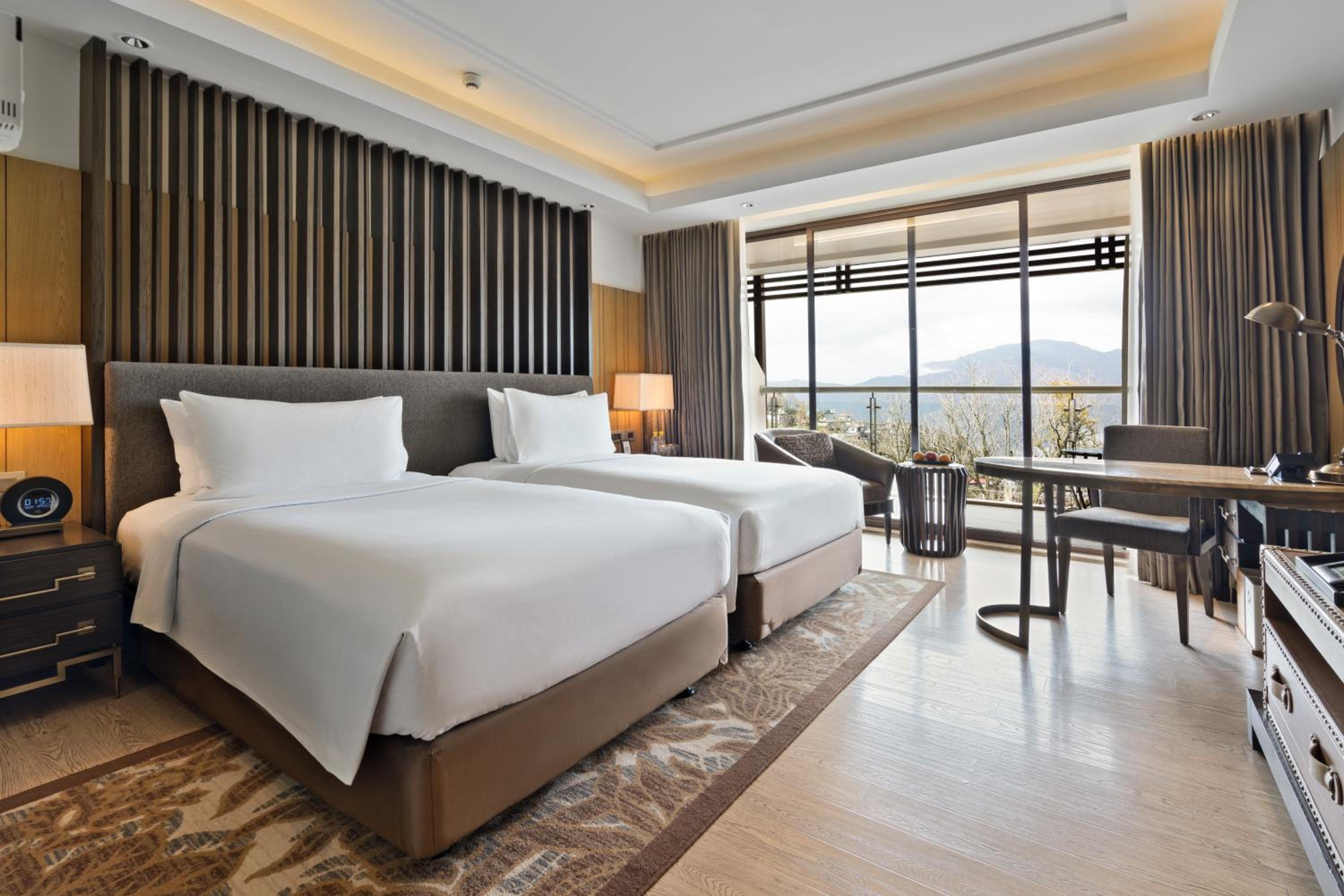 Scenic Valley View Twin Balcony Room with Bathtub - Enjoy INR 1,000 Signature Resort Credit per stay photo 1