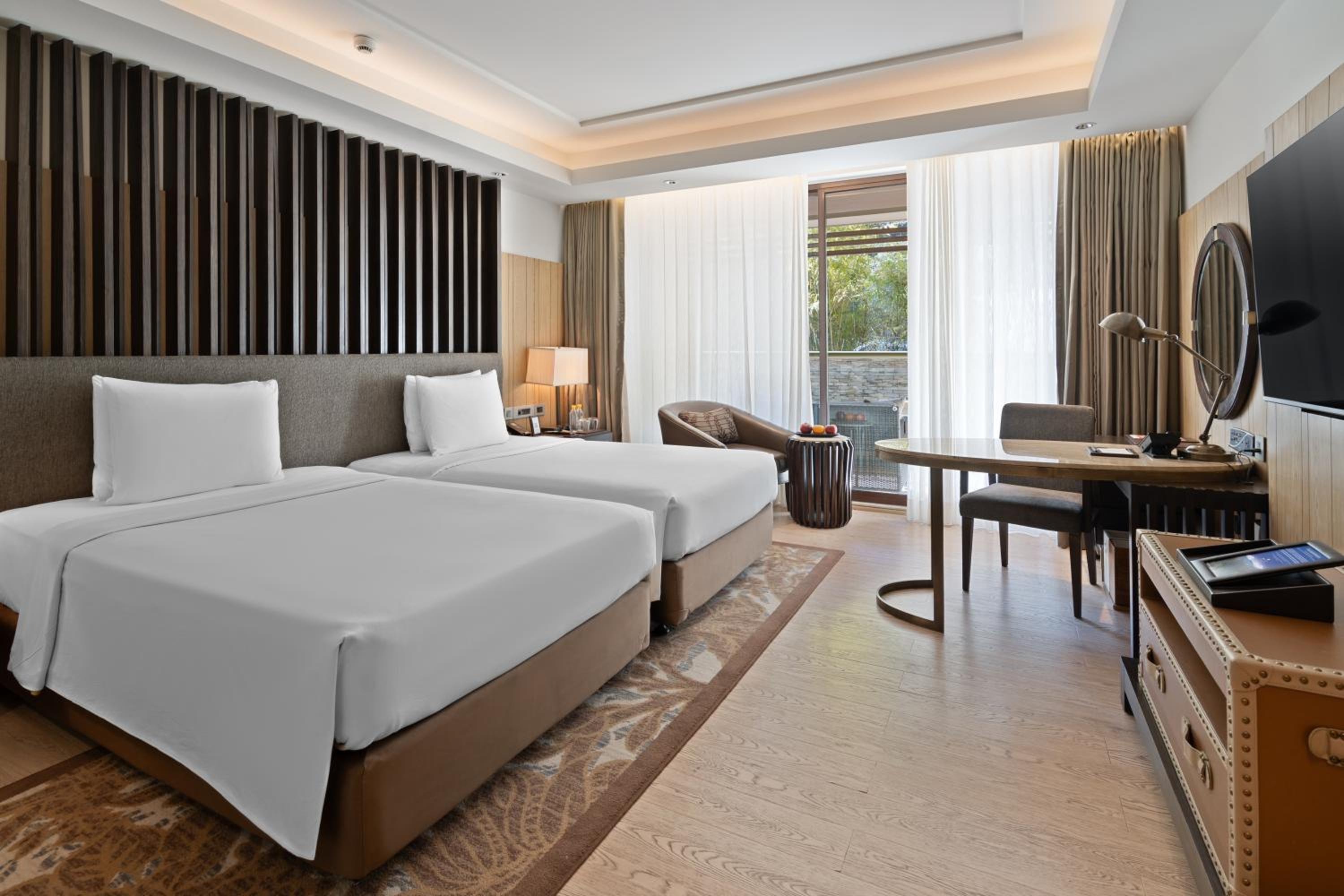 Deluxe Twin Balcony Room with Bathtub - Enjoy INR 1,000 Signature Resort Credit per stay photo 3