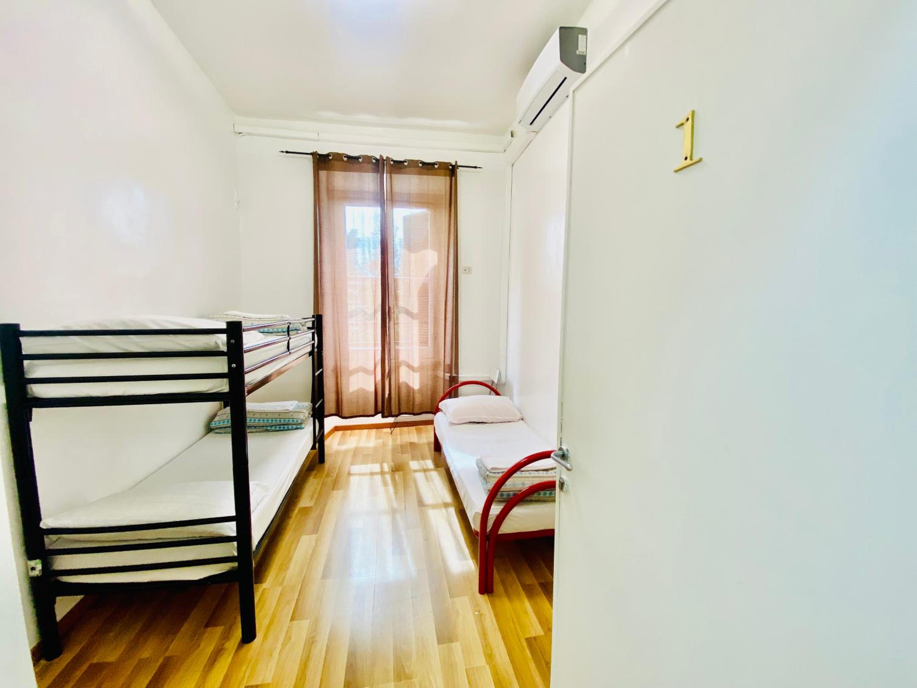Bed in 6-Bed Female Dormitory Room photo 1