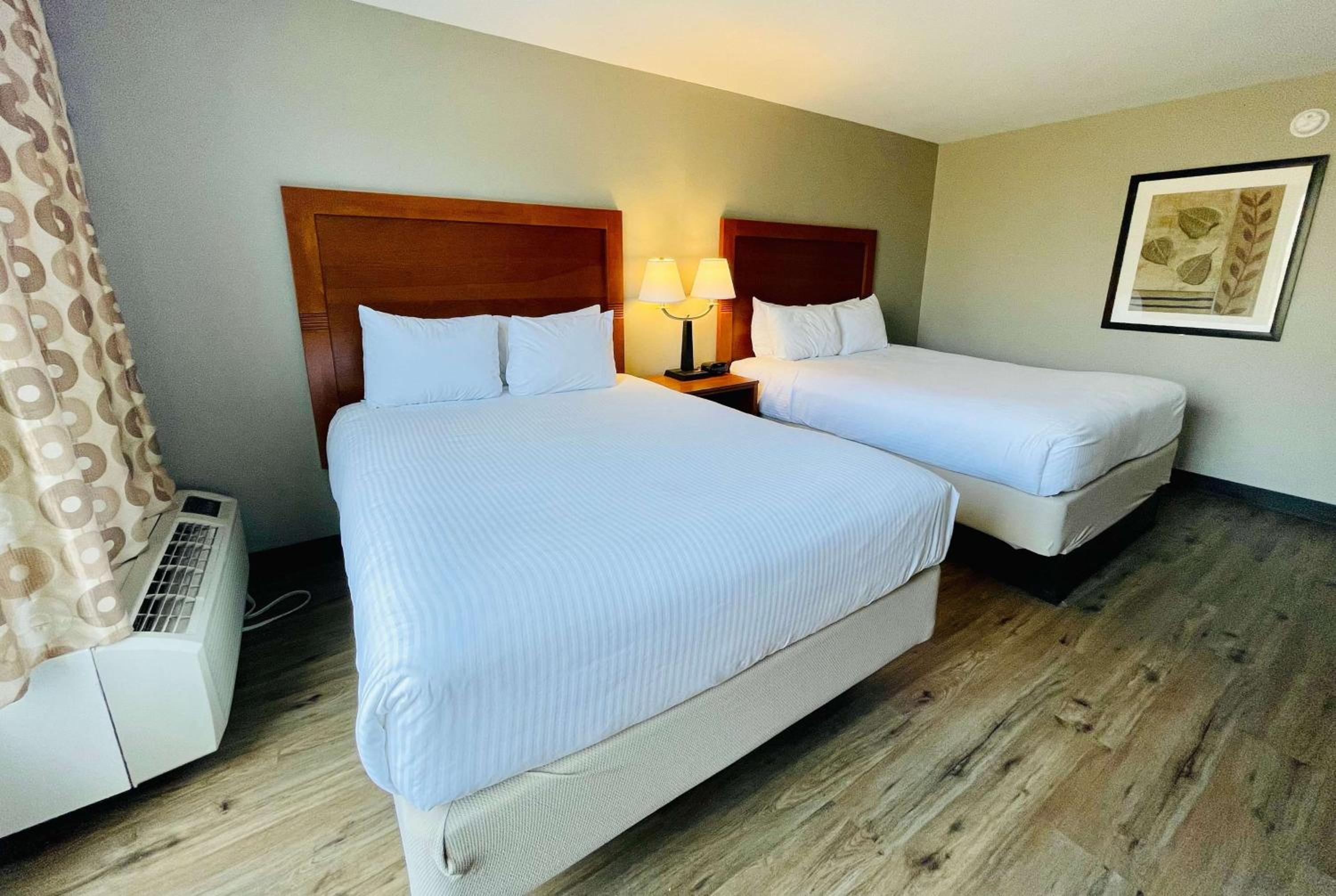 Superior Queen Room with Two Queen Beds and Sofa Bed - Kitchenette/Non-Smoking - Photo 1