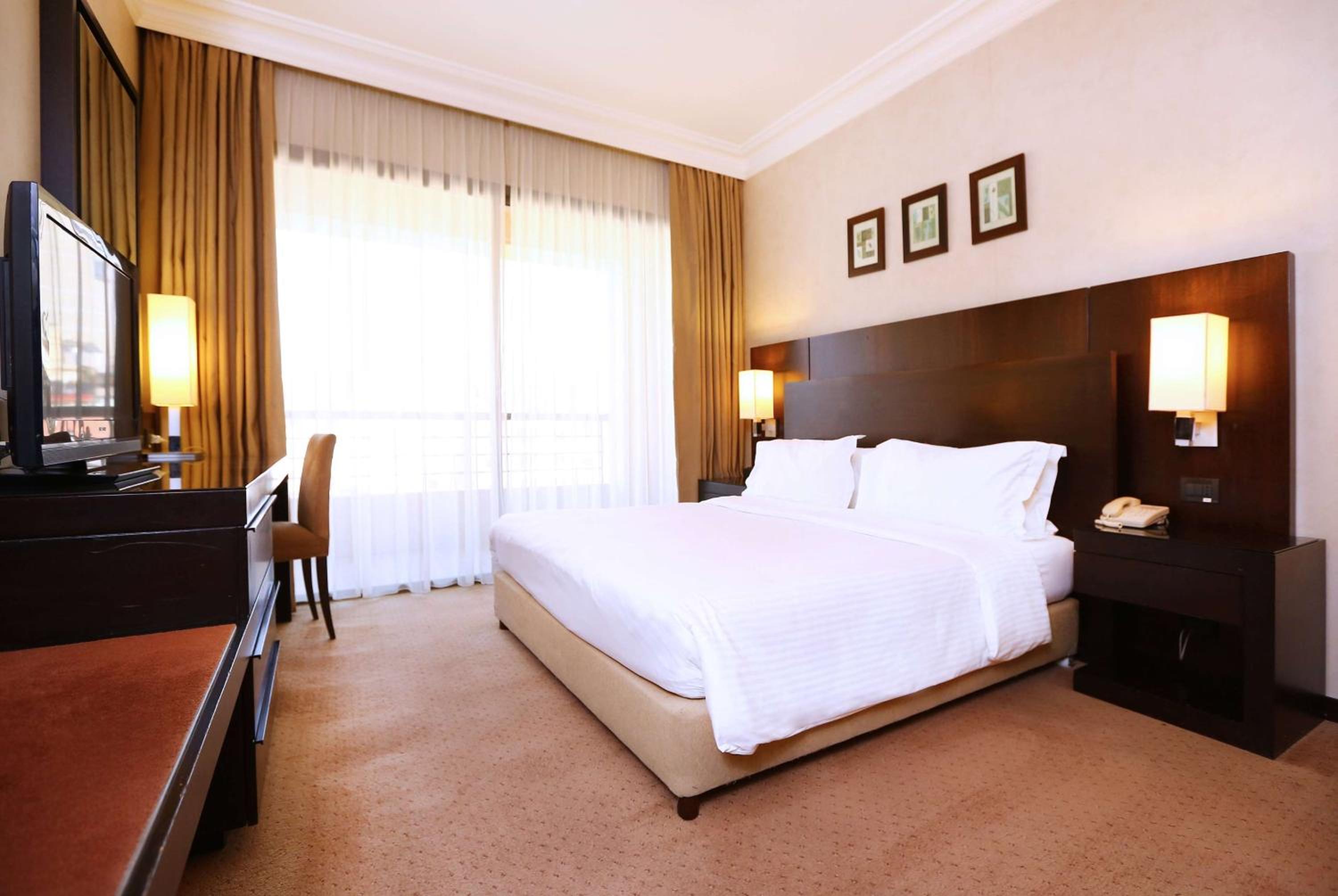 Premium King Room - Non-Smoking - Photo 1