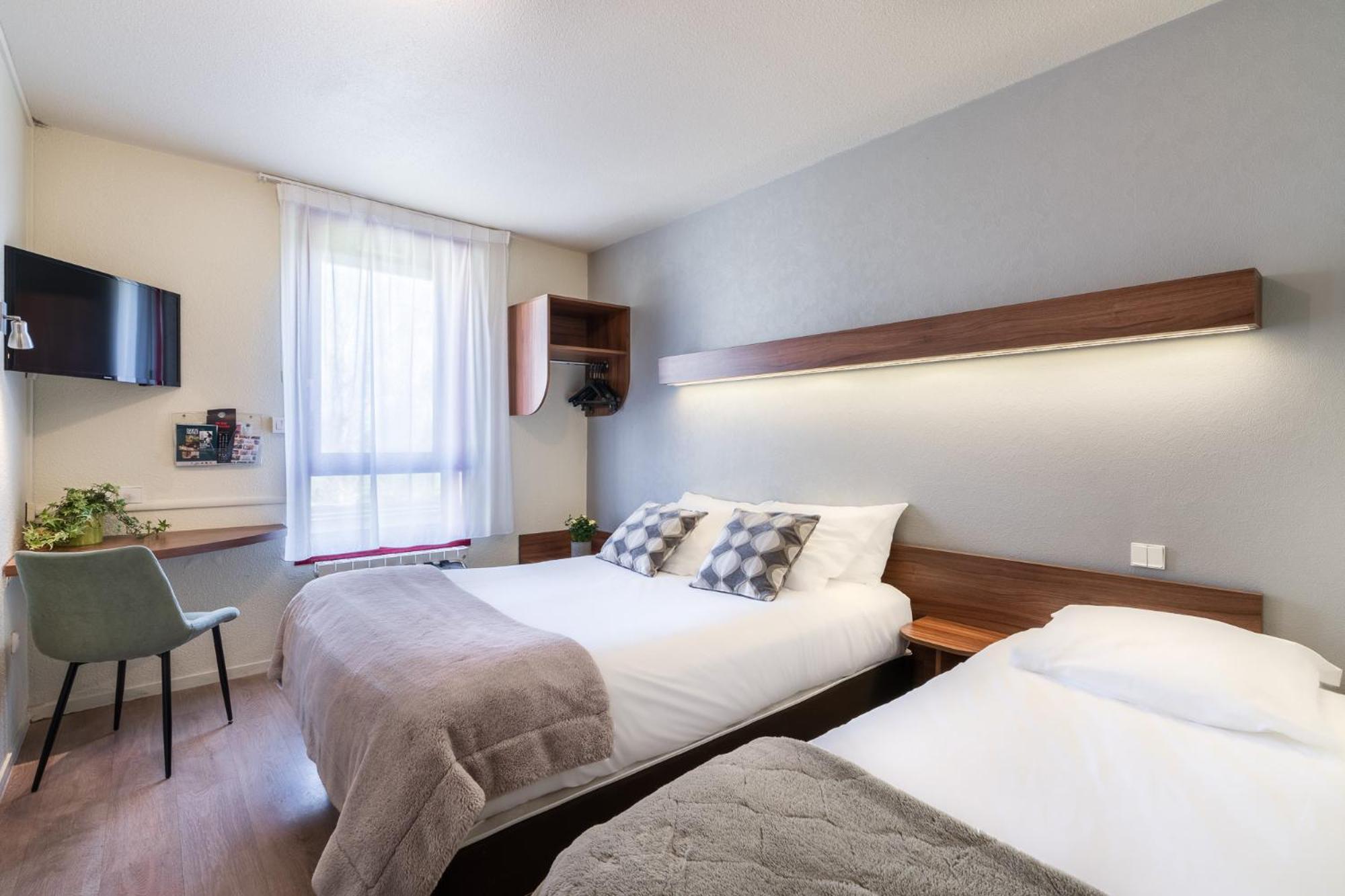 Comfort Triple Room with Garden View - Photo 1