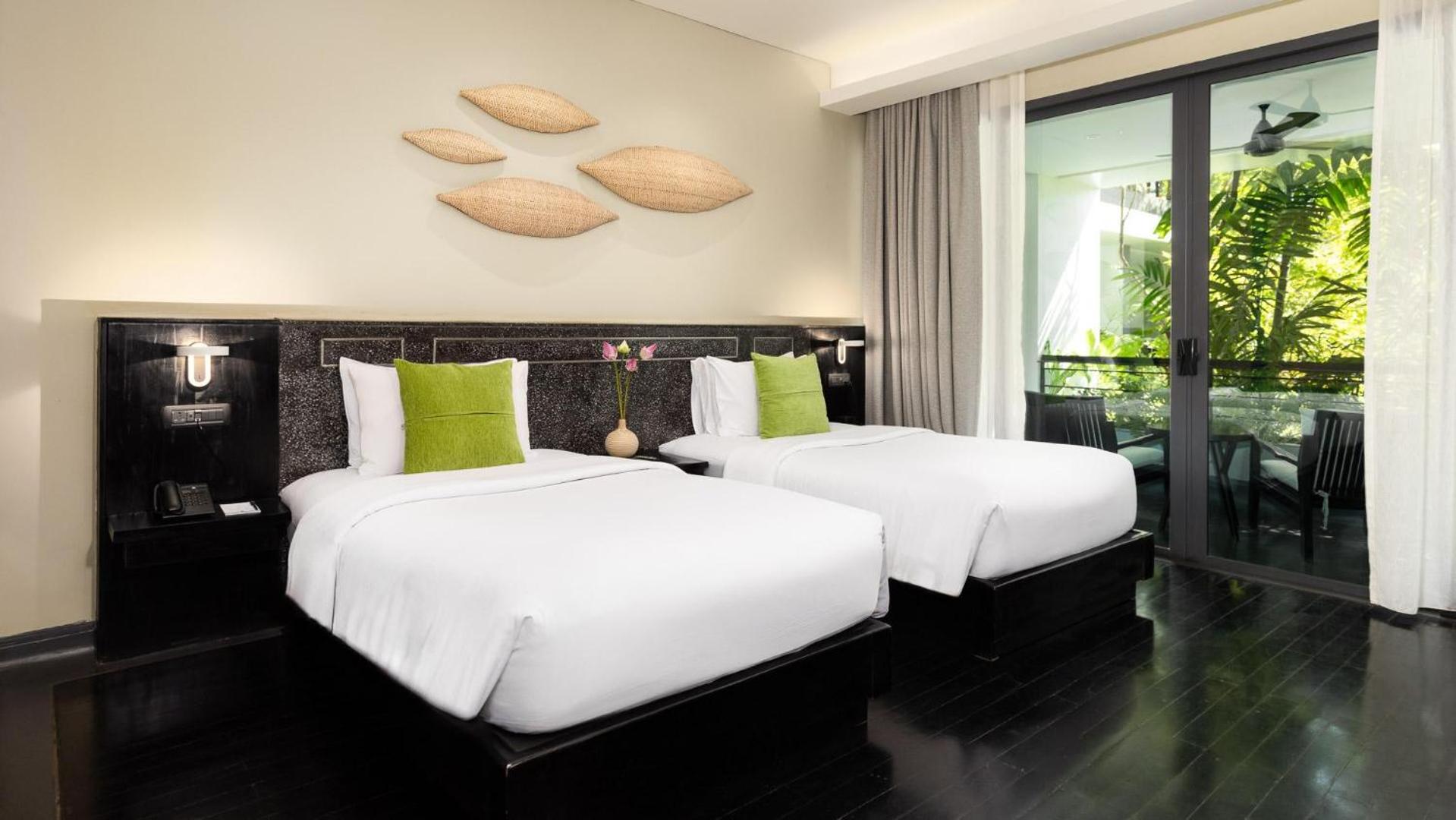 Habitación Deluxe Twin con recogida en el aeropuerto, minibar gratuito y más.