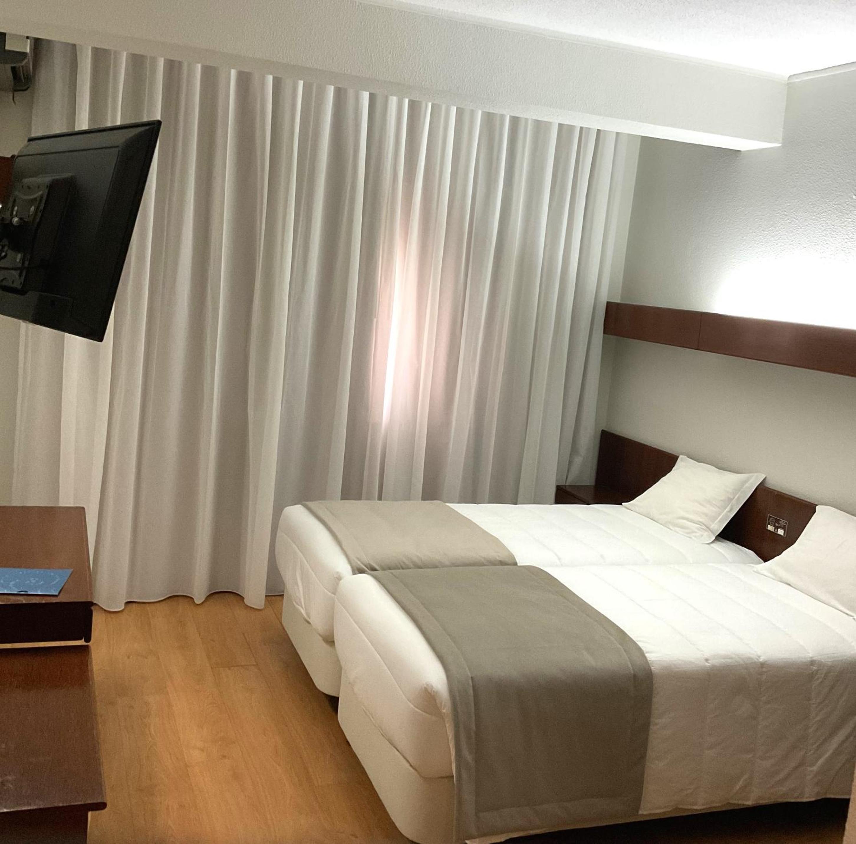 Quarto Duplo