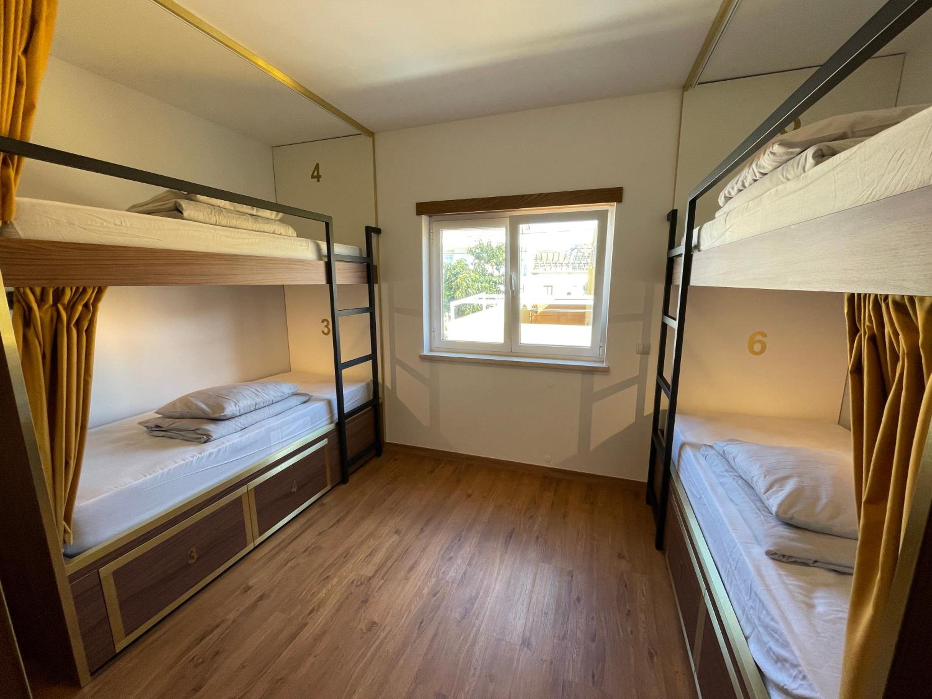 Bed in 6-Bed Female Dormitory Room photo 1