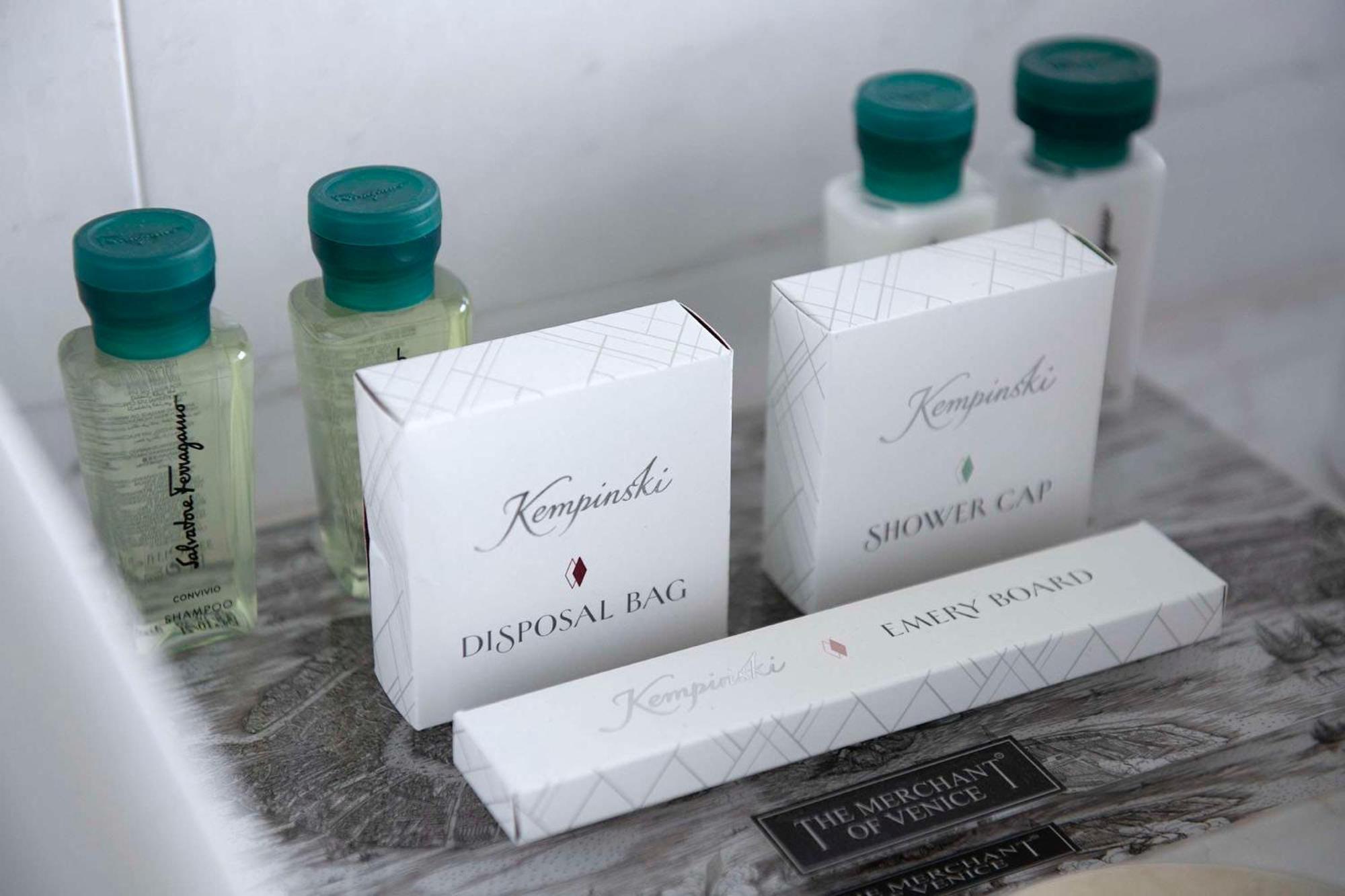 collection of skin care products on a marble countertop