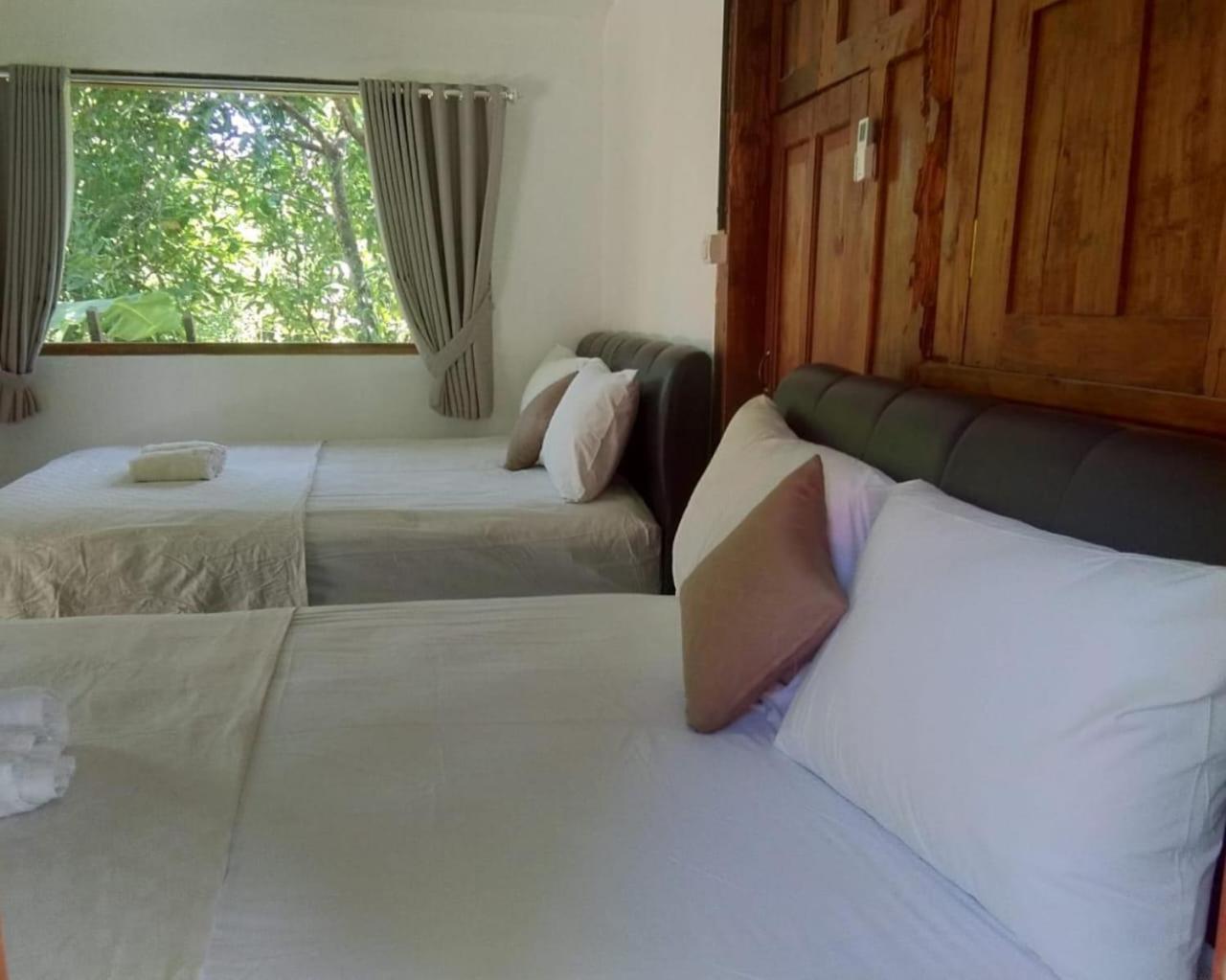 Quadruple Room with Garden View - Photo 1