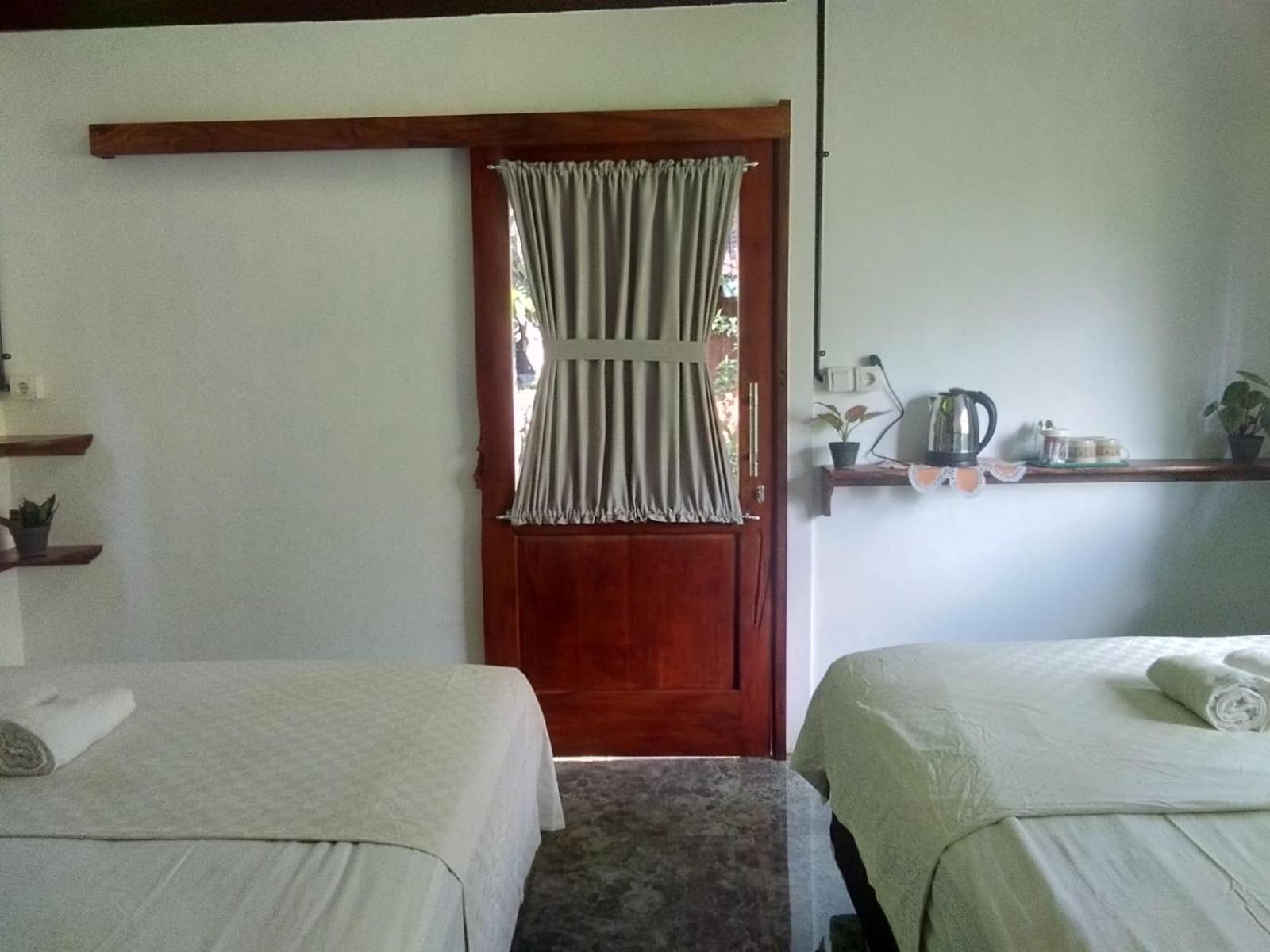 Quadruple Room with Garden View - Photo 8