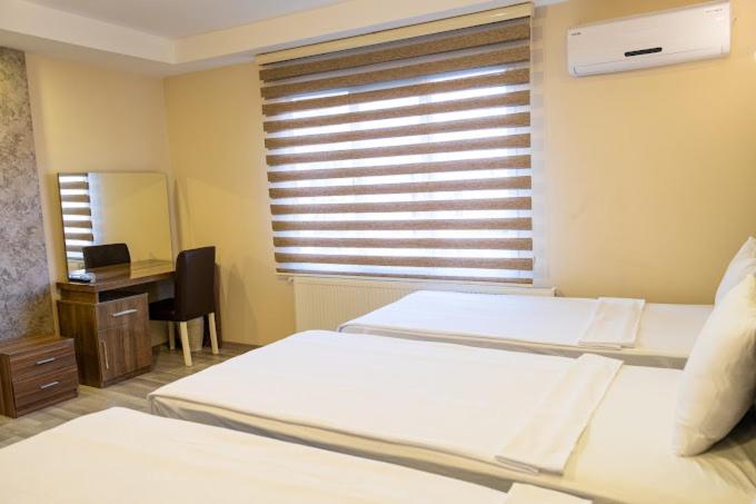 Quarto Triplo Deluxe