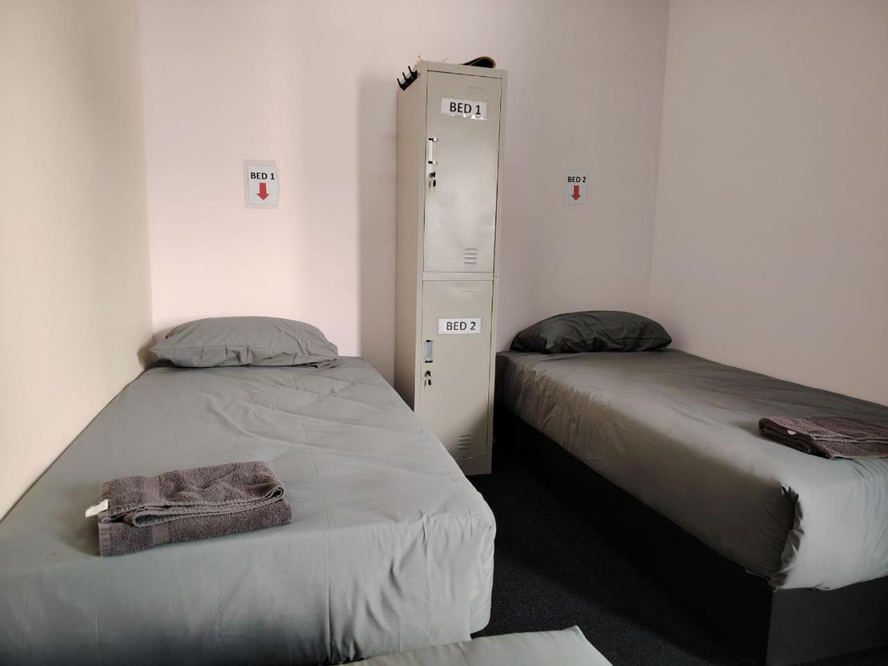 Single Bed in Male Dormitory Room with Shared Bathroom photo 1