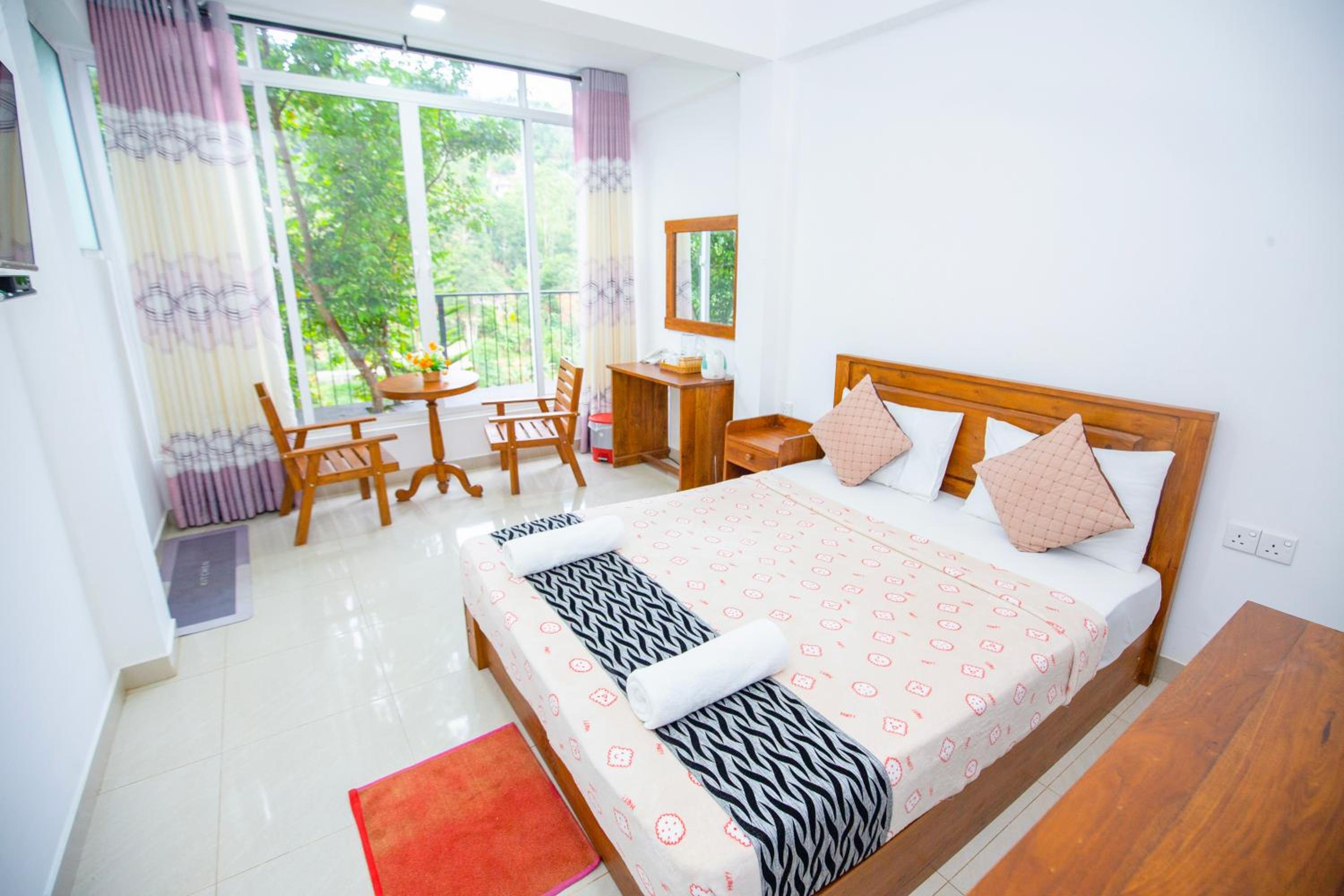 Deluxe Room - Photo 16