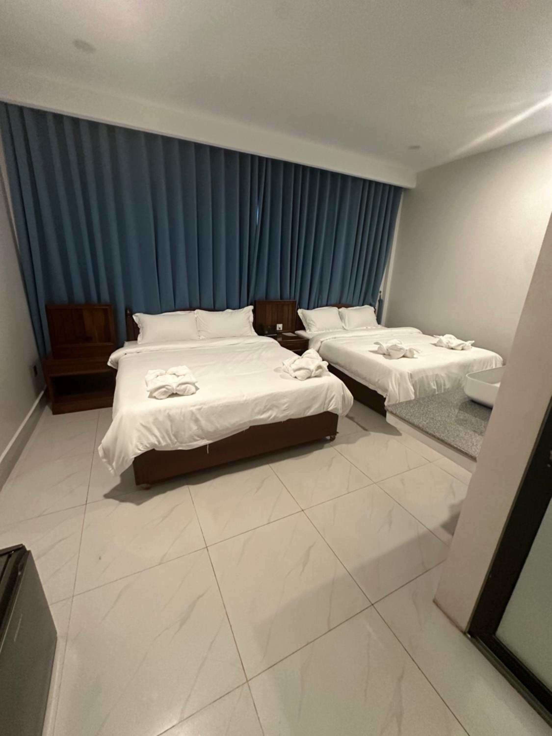 Queen Room with Two Queen Beds - Photo 1