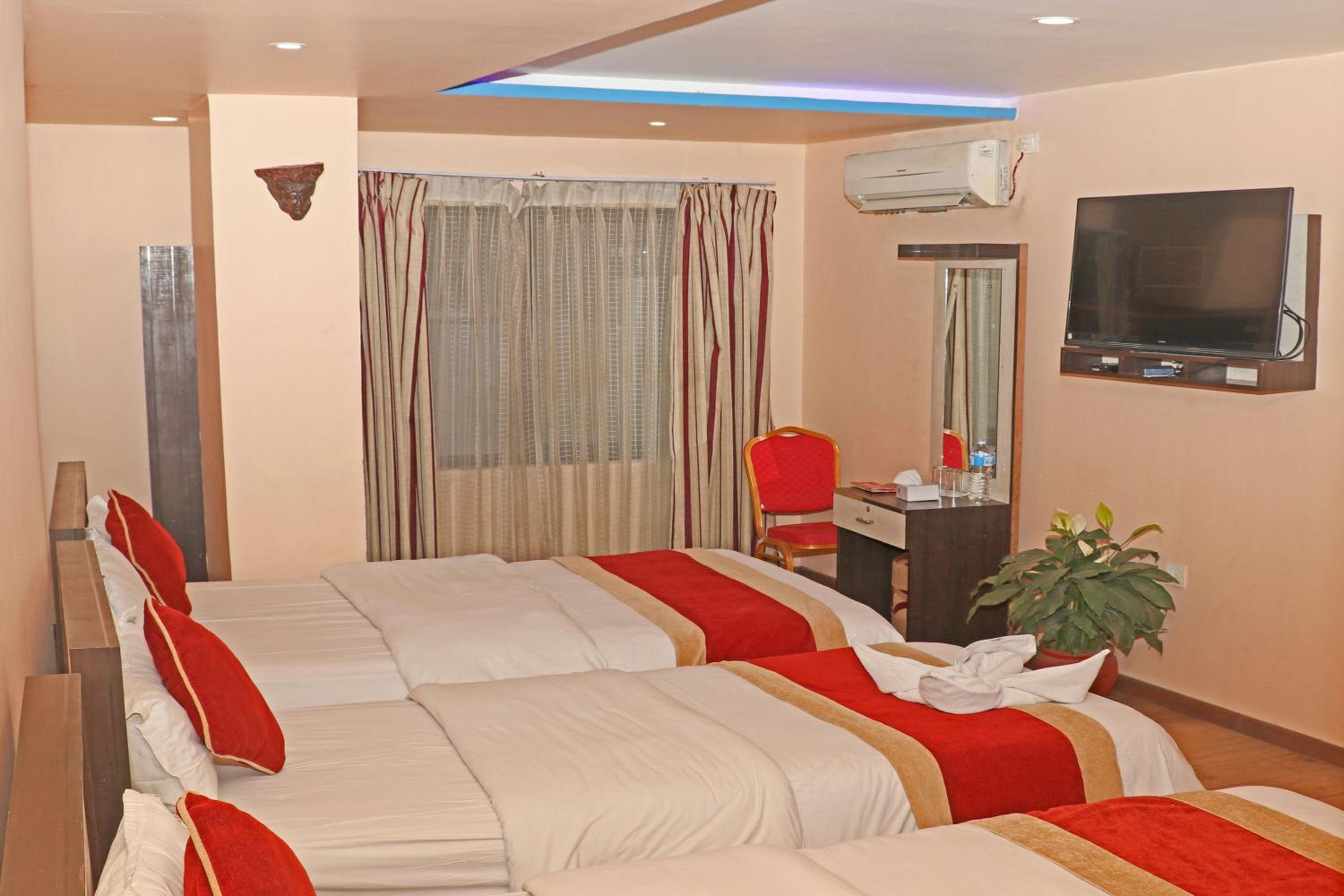 Deluxe Triple Room - Photo 9