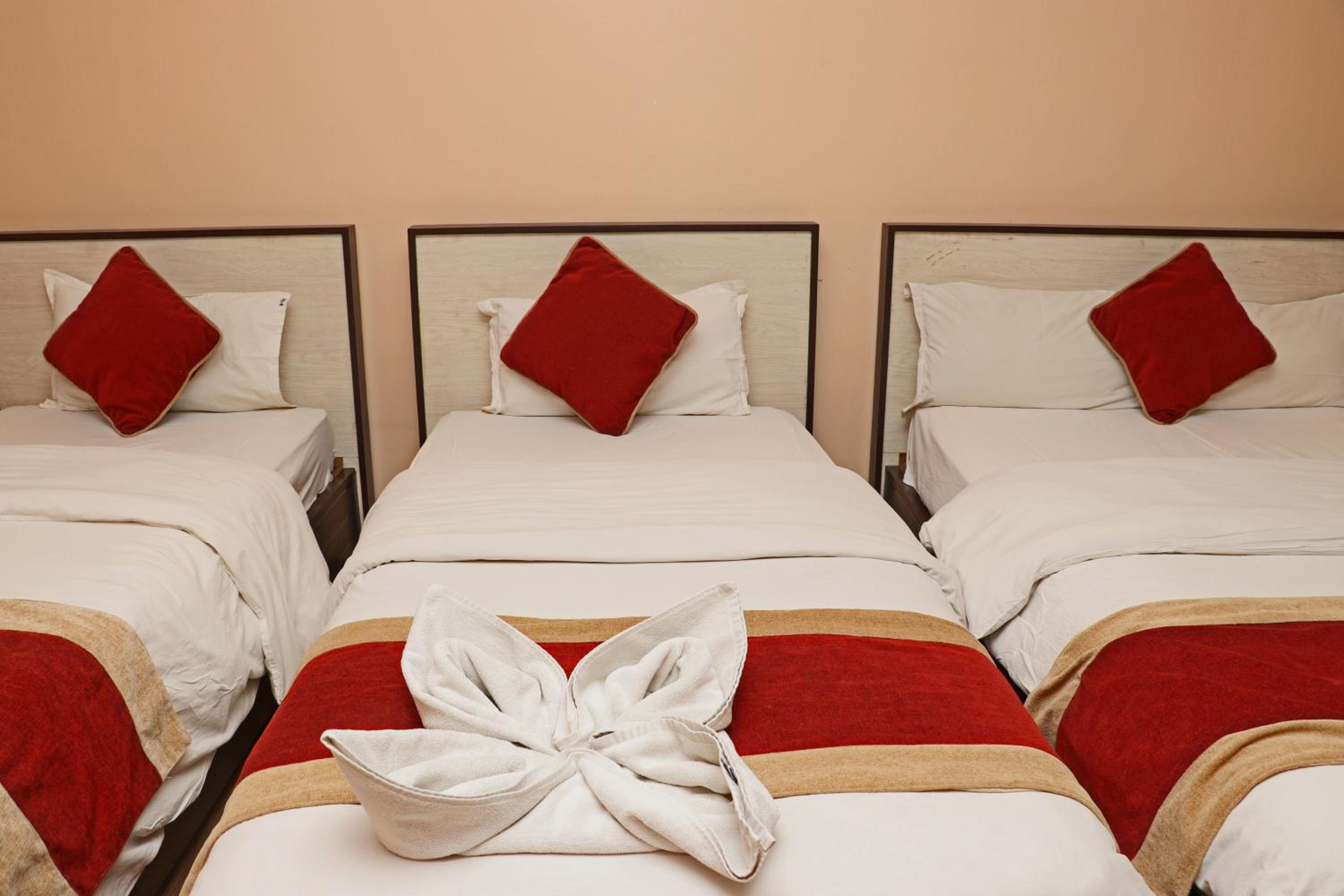 Deluxe Triple Room - Photo 17